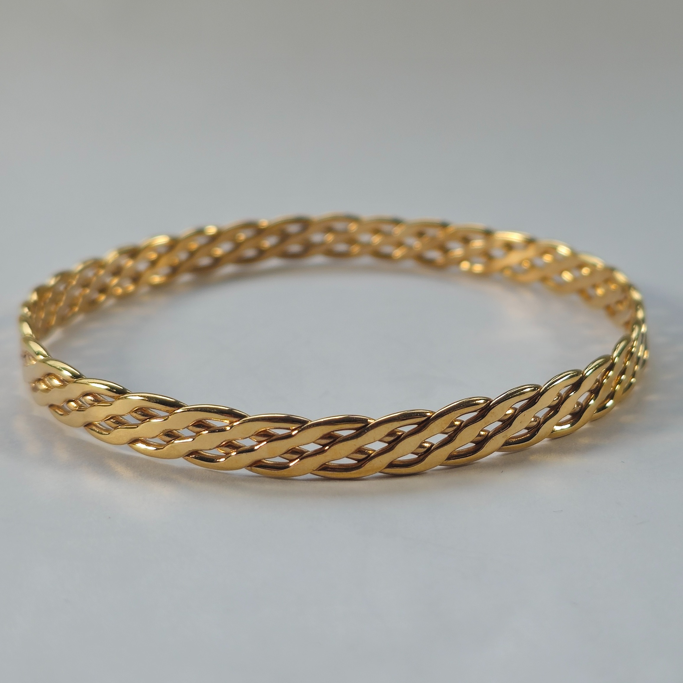 Product photo for 9ct Gold Braided Slave Bangle