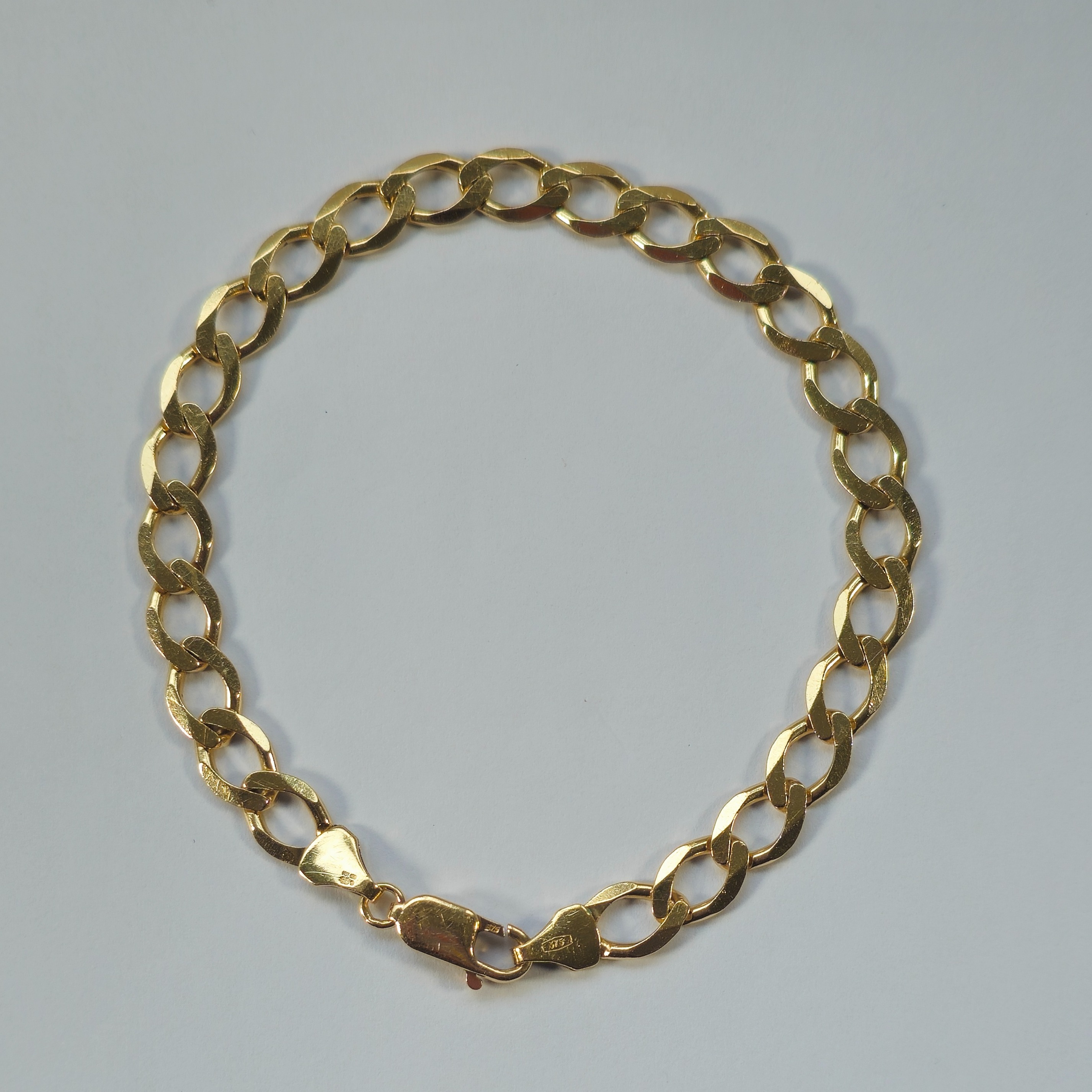 Product photo for 9ct Gold Curb Bracelet 8.4