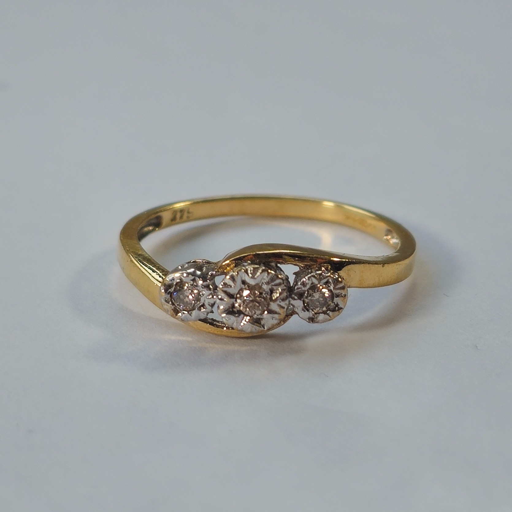 Product photo for 9ct Gold Diamond Twisted Design Trilogy Ring N1/2