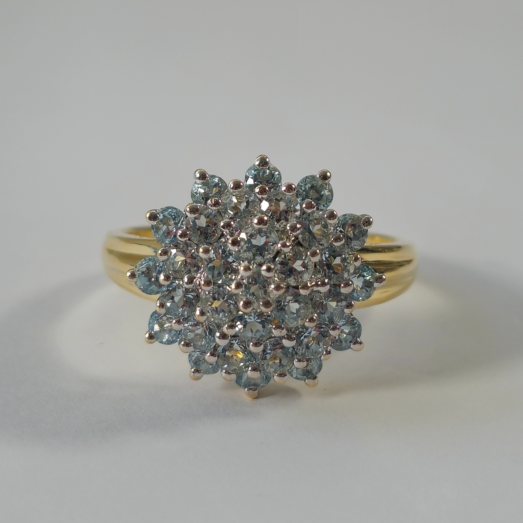 Product photo for 9ct Gold Natural White Stone Layered Flower Ring Size U