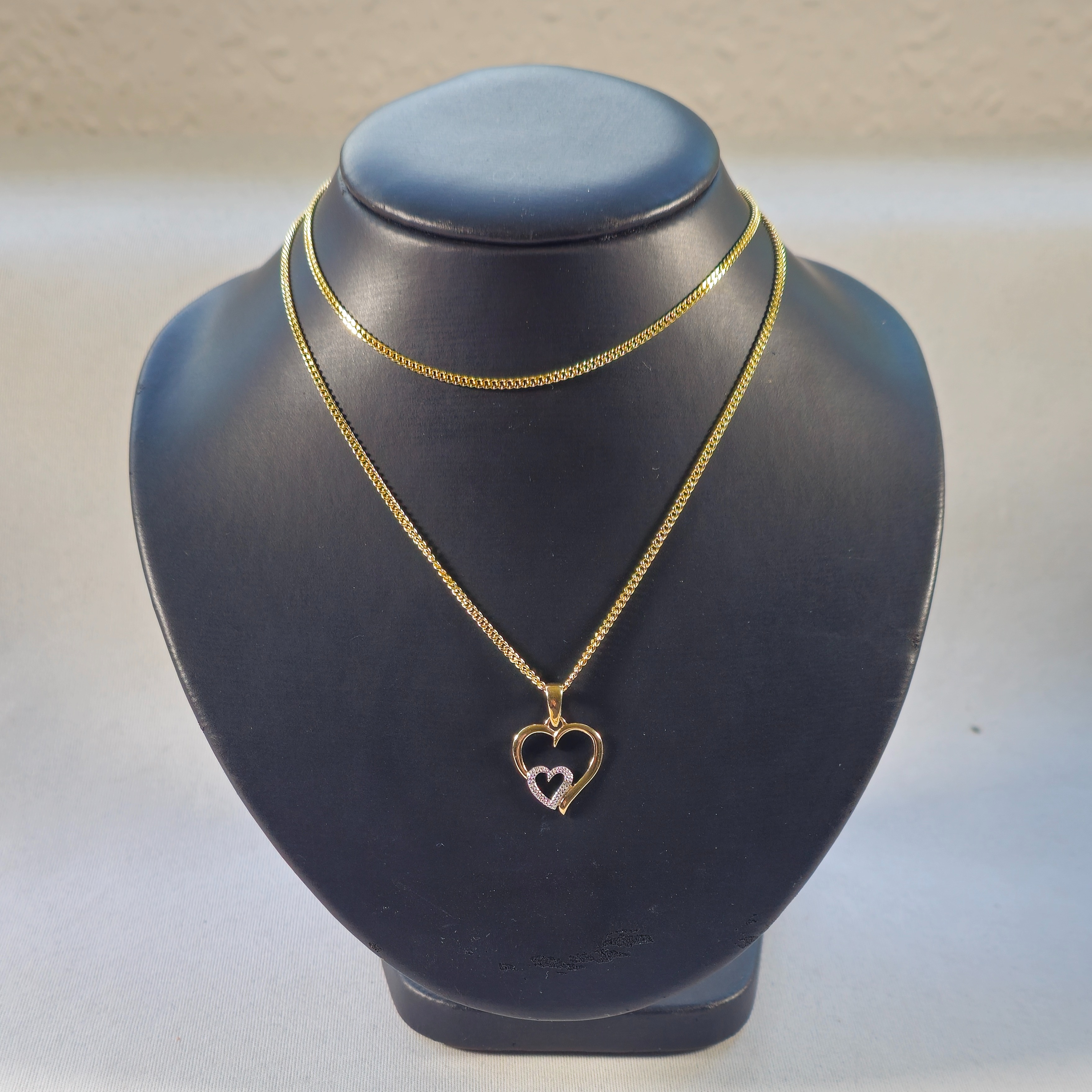 Product photo for 9ct Gold Heat Pendant & Curb Chain 24