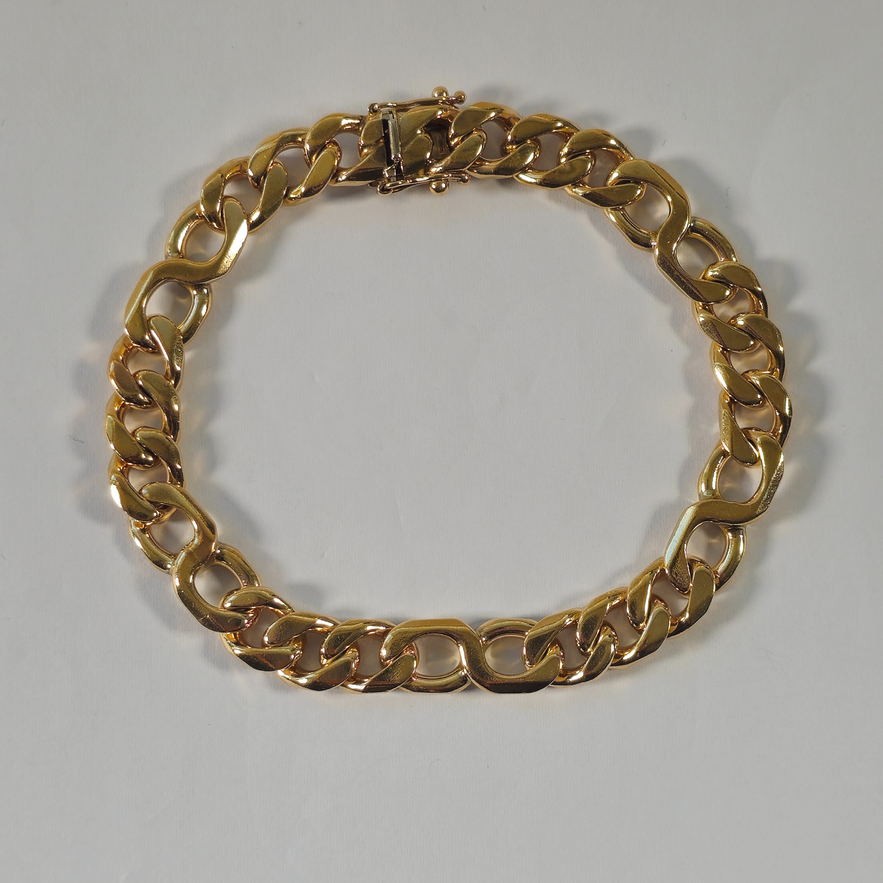 Product photo for 9ct Gold Infinity Curb Figaro Style Bracelet 7.8