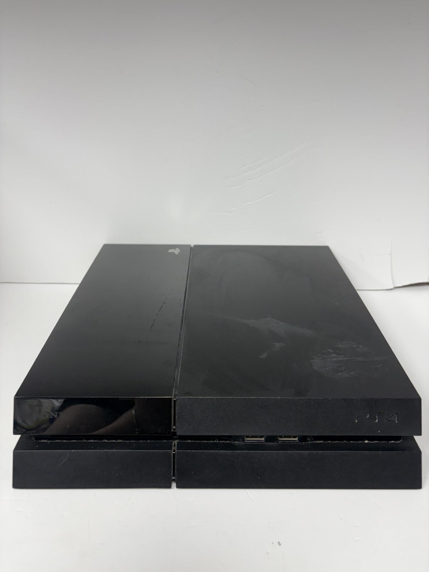 Product photo for PS4 original 500gb black with wires and controller unboxed