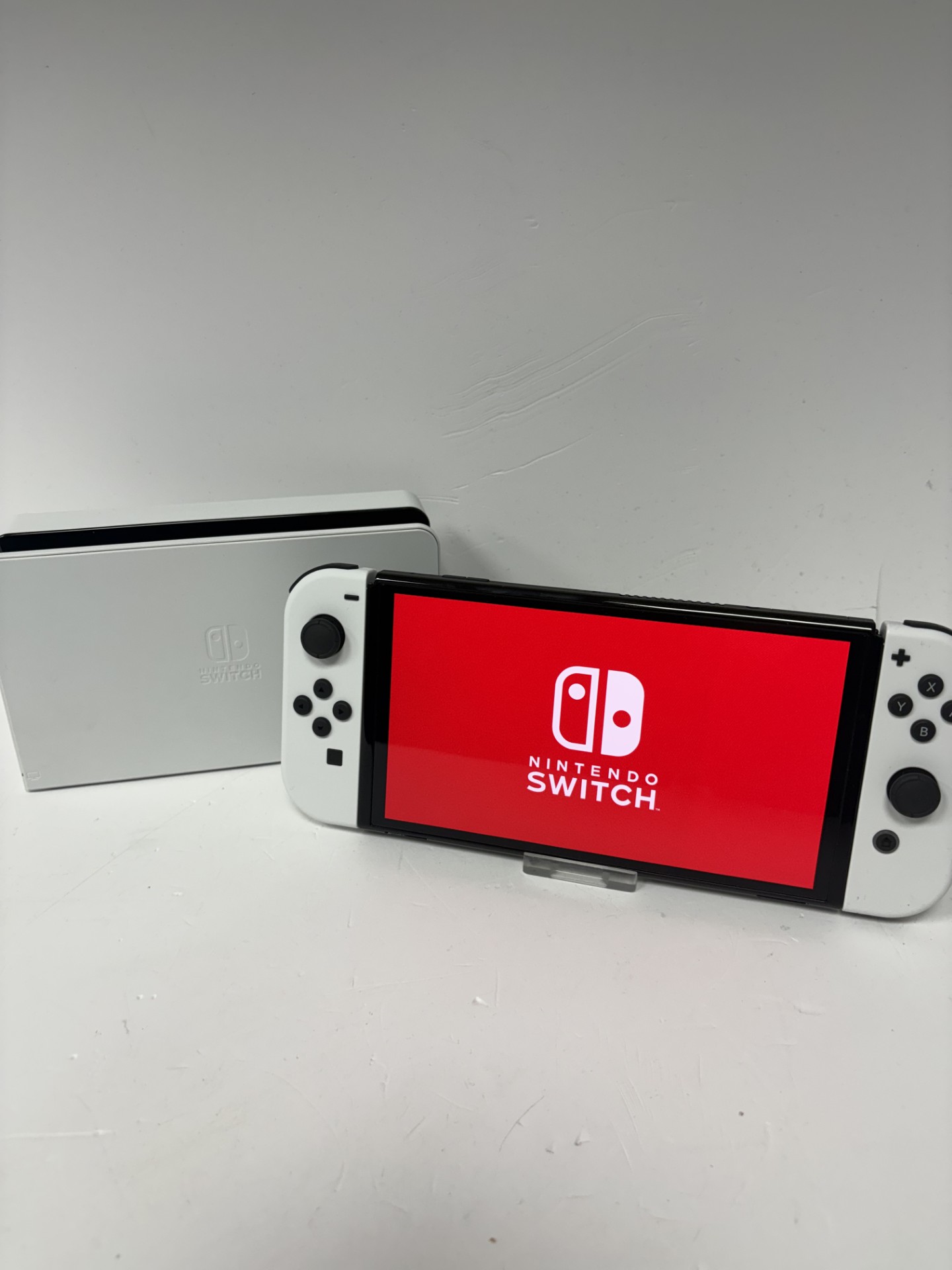 Product photo for Nintendo nintendo switch oled 64gb white with all accessories unboxed