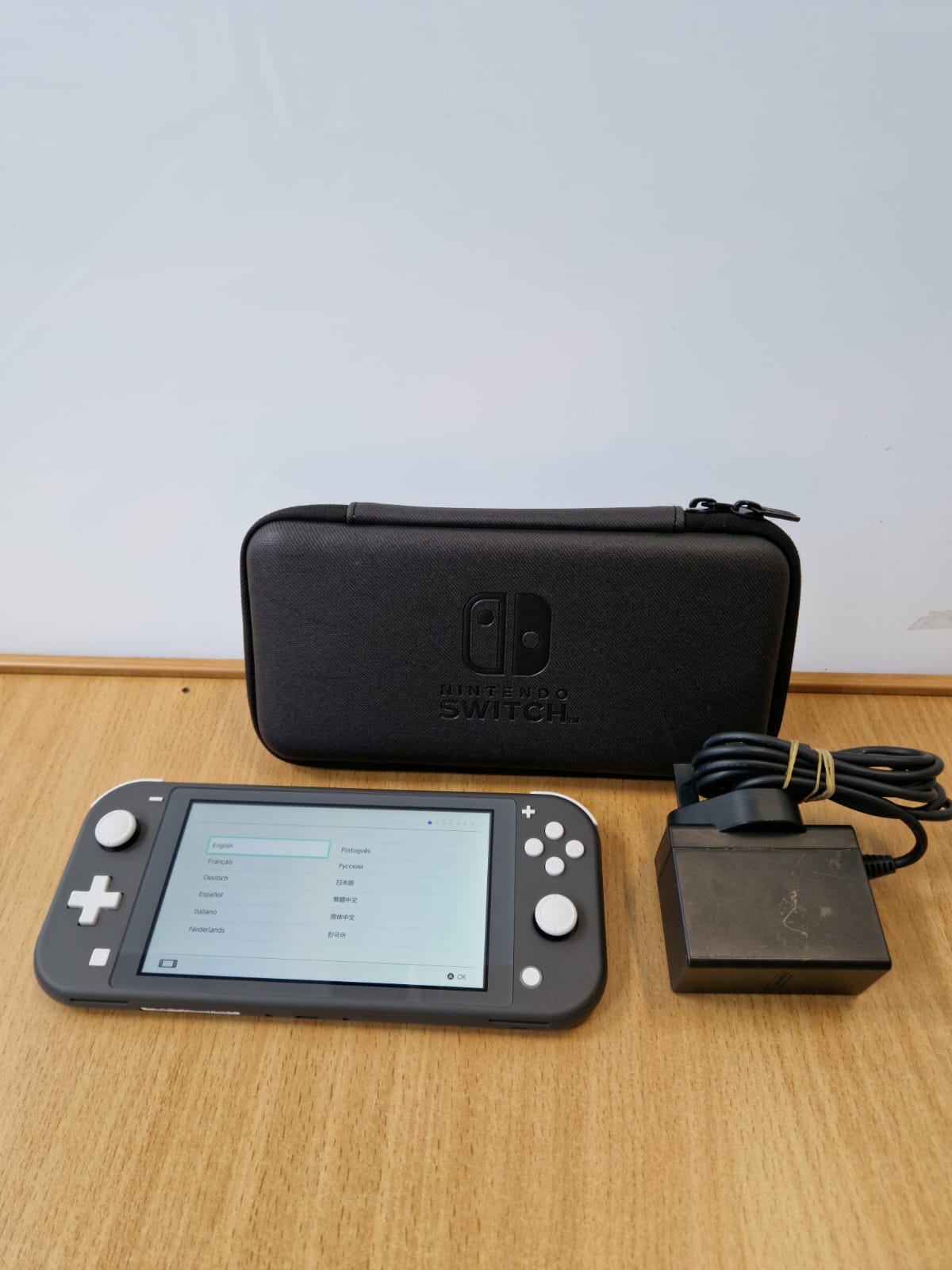 Product photo for Nintendo Switch  Nintendo Switch Lite Unboxed w/ Case & Charger - 12 Month Warranty