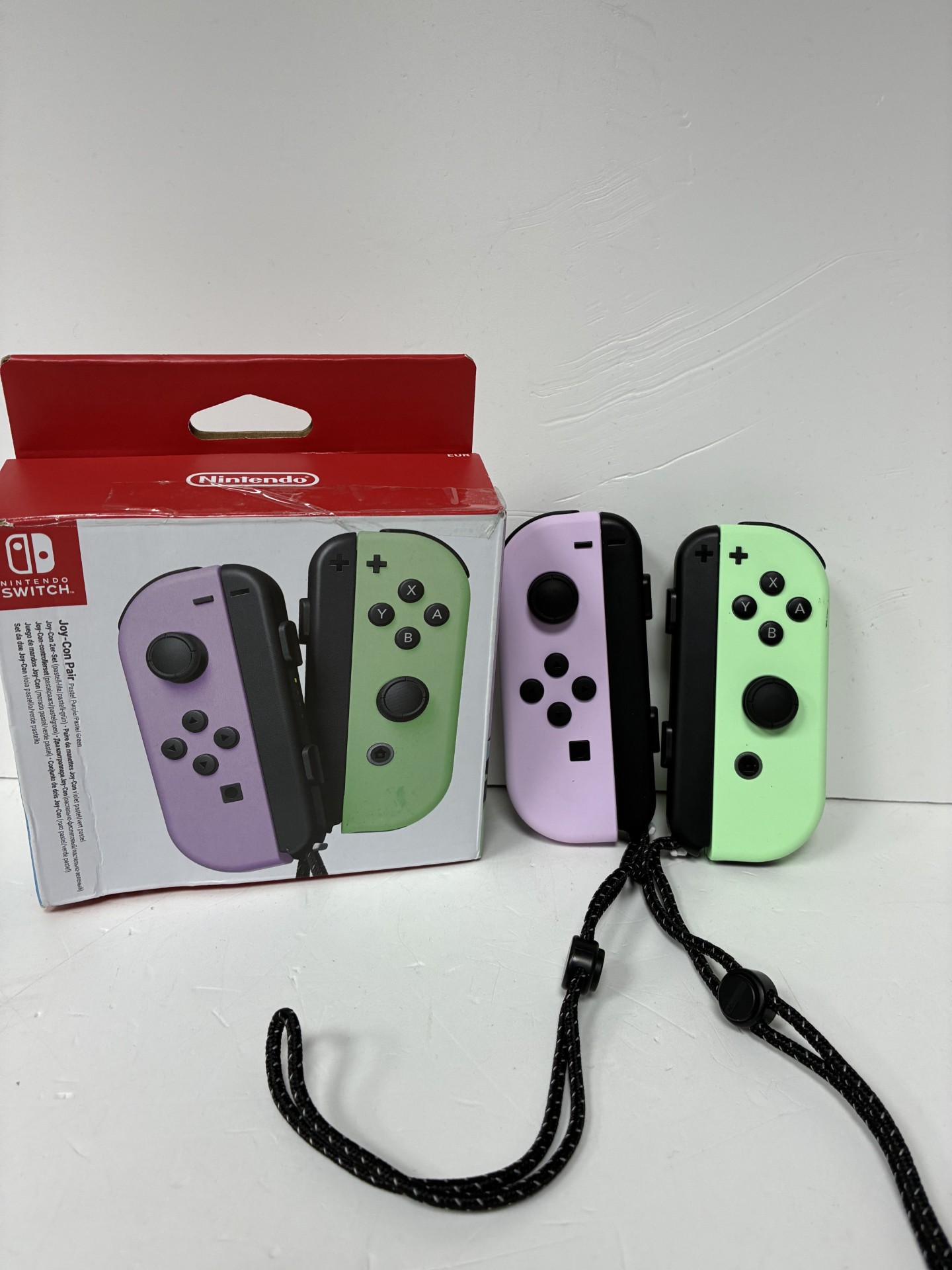 Product photo for nintendo joy con pack green and pink boxed