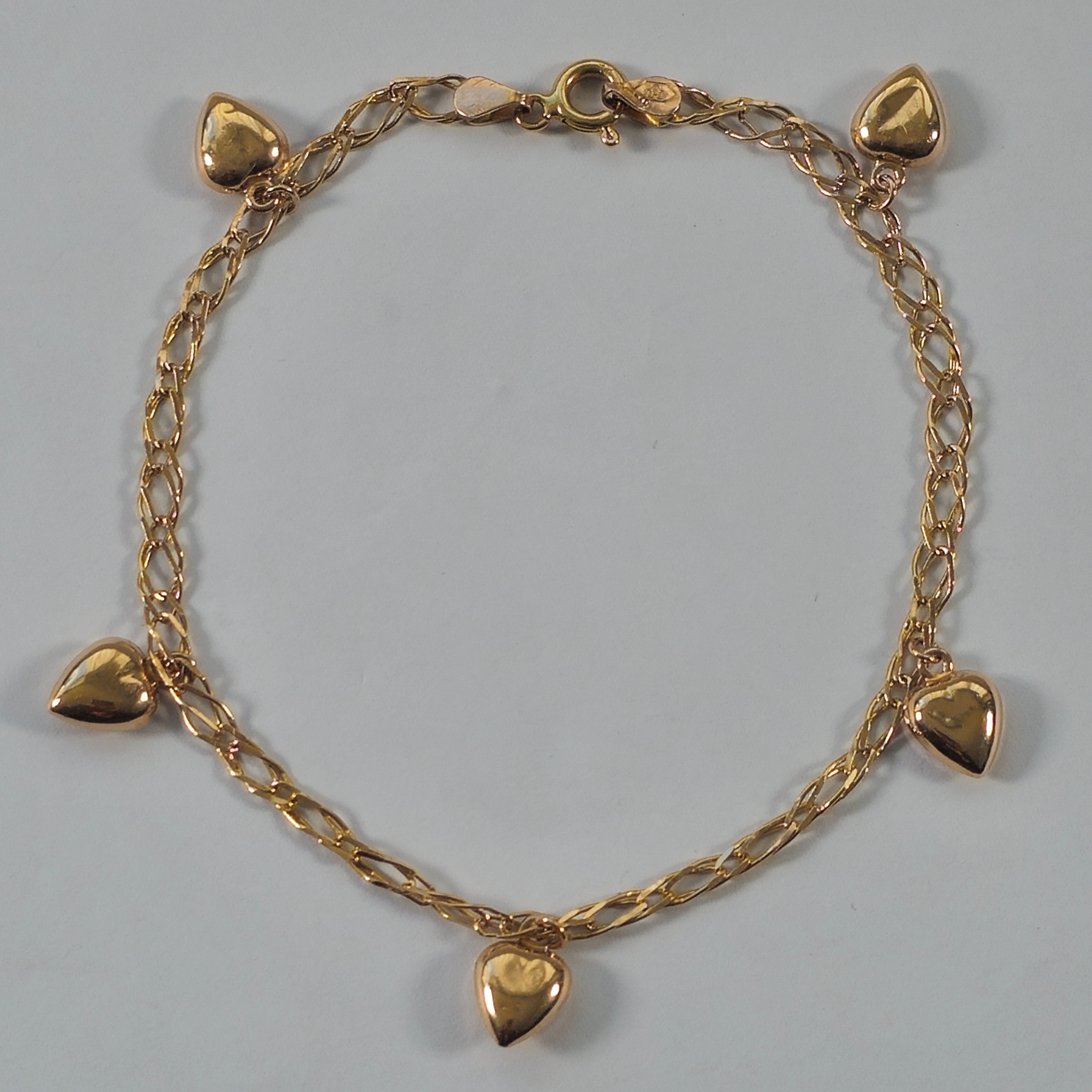 Product photo for 9ct Gold Heart Charm Bracelet 8