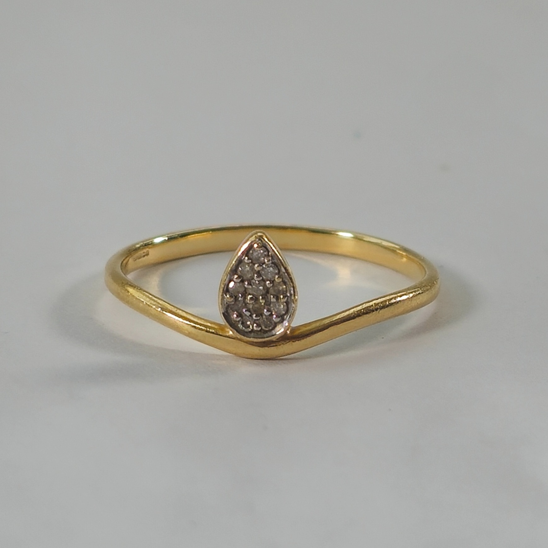 Product photo for 10ct Gold Tiny Round Diamond Pear Shape Wavy Band Stacking Ring Size R