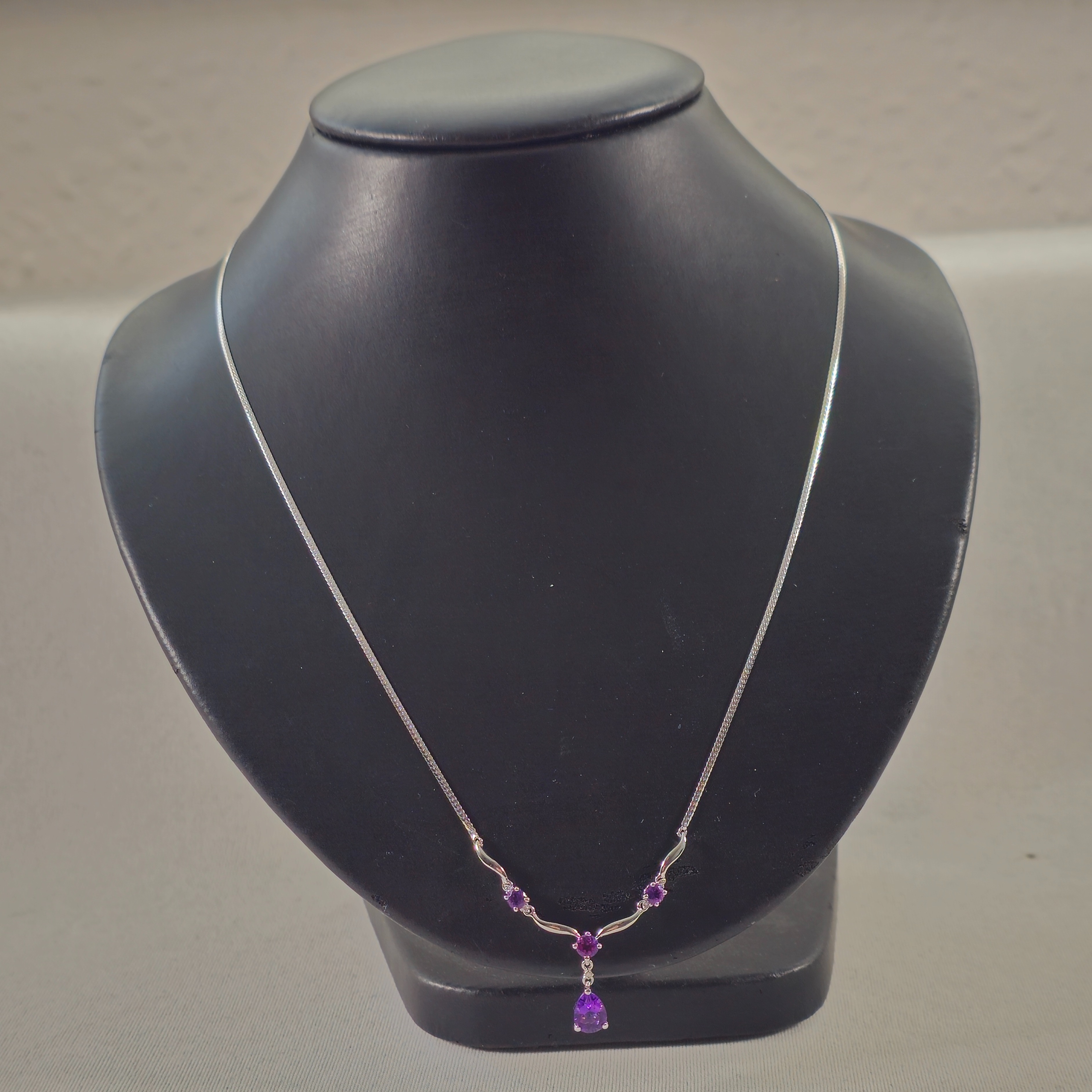 Product photo for 9ct White Gold Purple Stones Y Necklace 18.11
