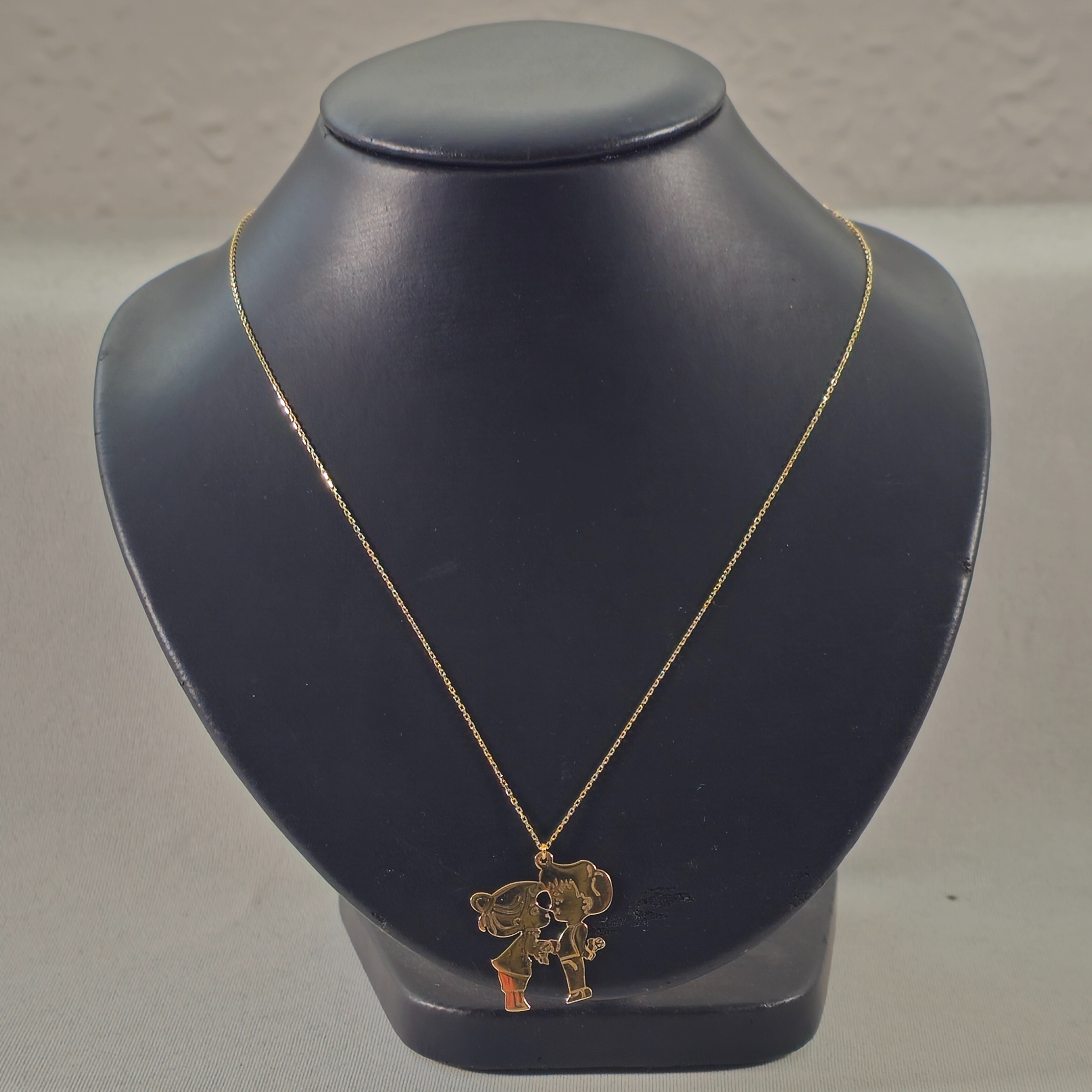 Product photo for 14ct Gold Boy & Girl Kissing Pendant Chain 16.9