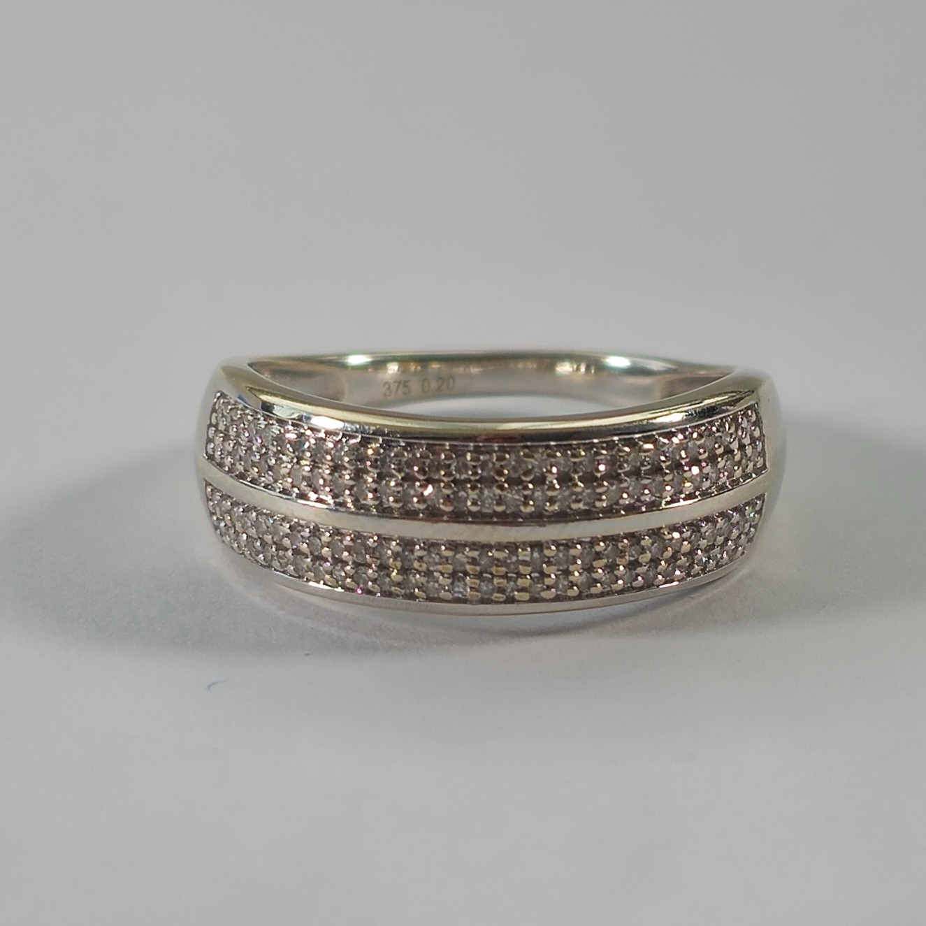 Product photo for 9ct Gold White 0.20ct Diamond Half Band Ring Size K