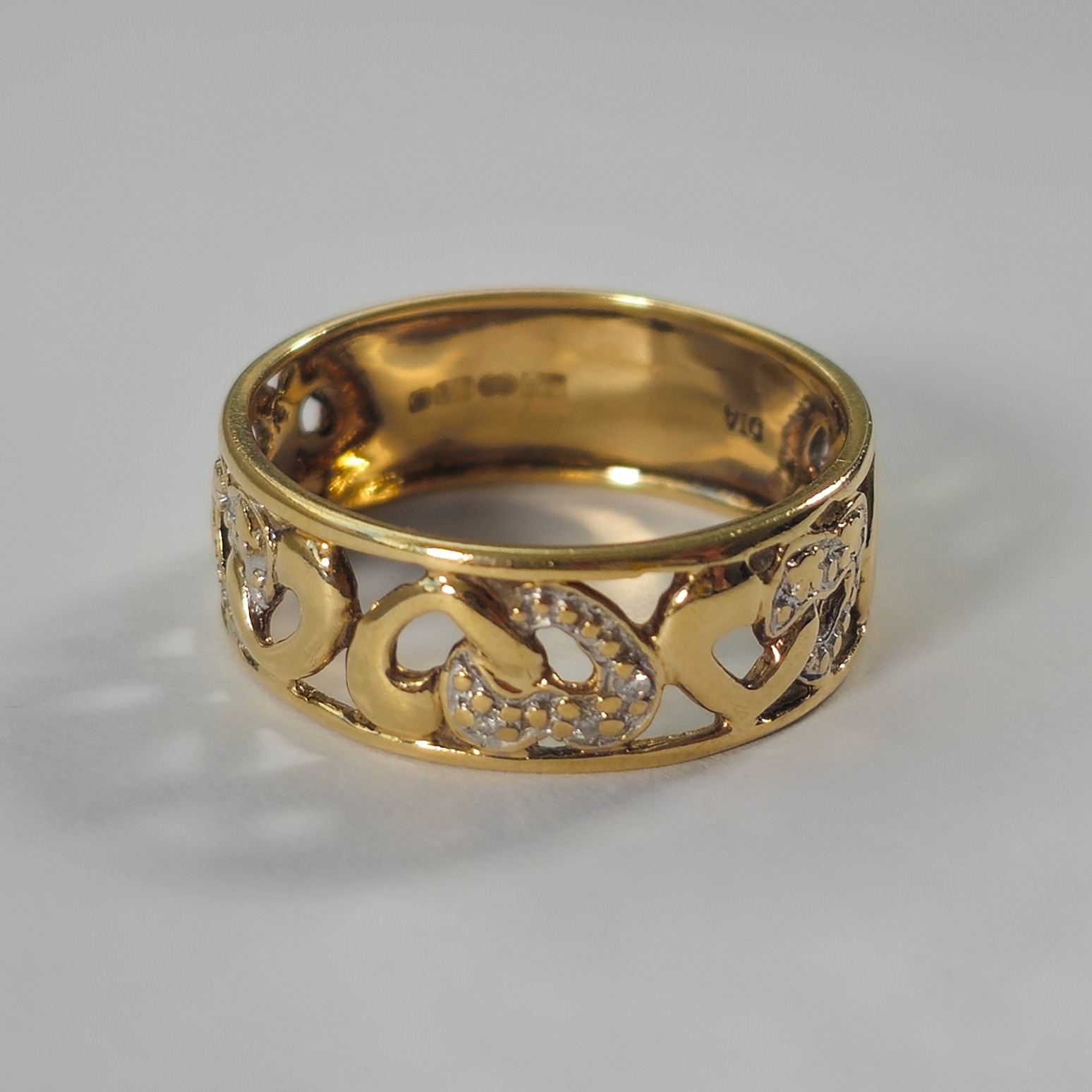 Product photo for 9ct Gold Tiny Diamond Heart Band Ring Size O