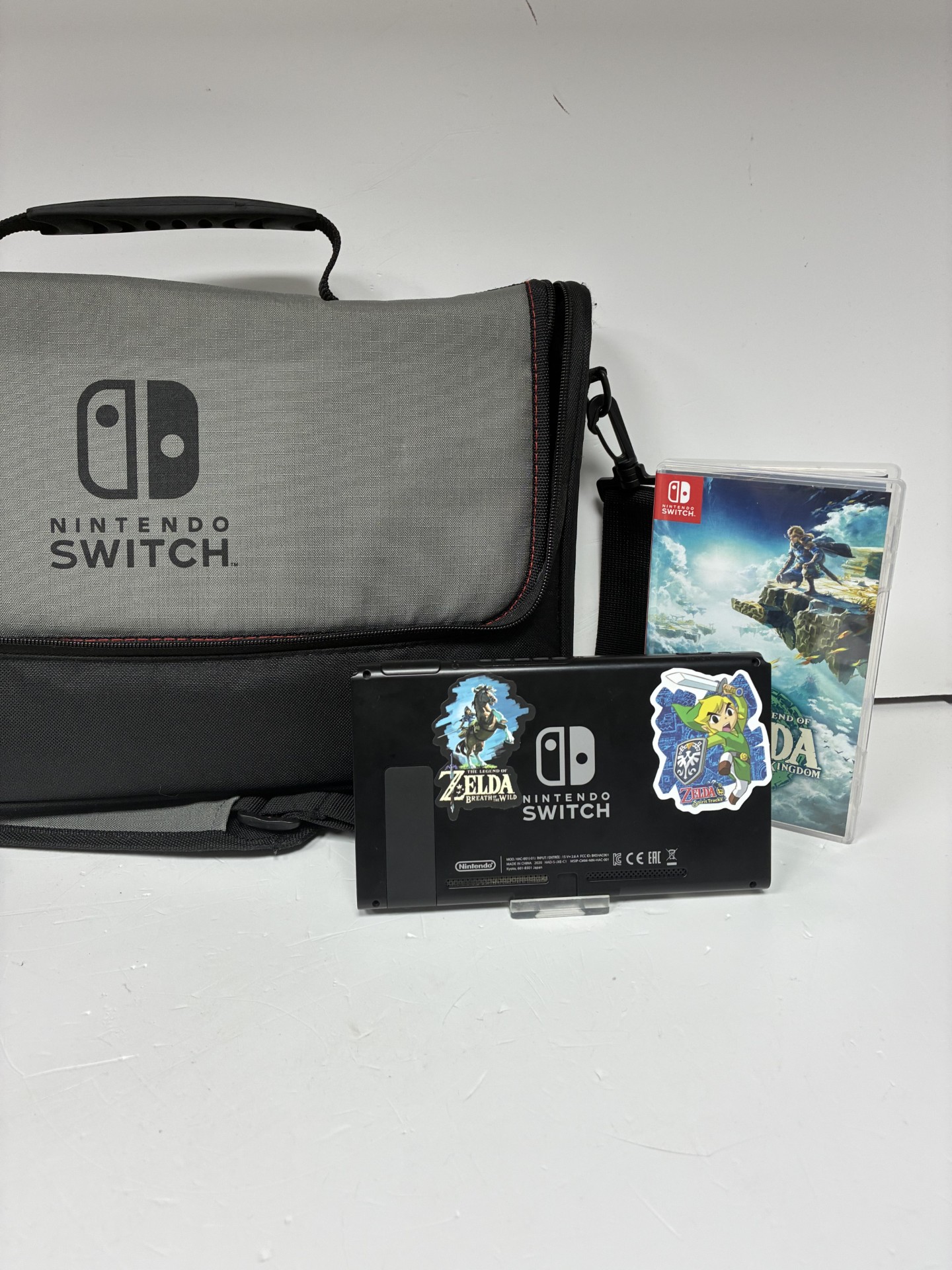 Product photo for NINTENDO SWITCH WITH CONTROLLER AND DOCKING STATION BAG GAME