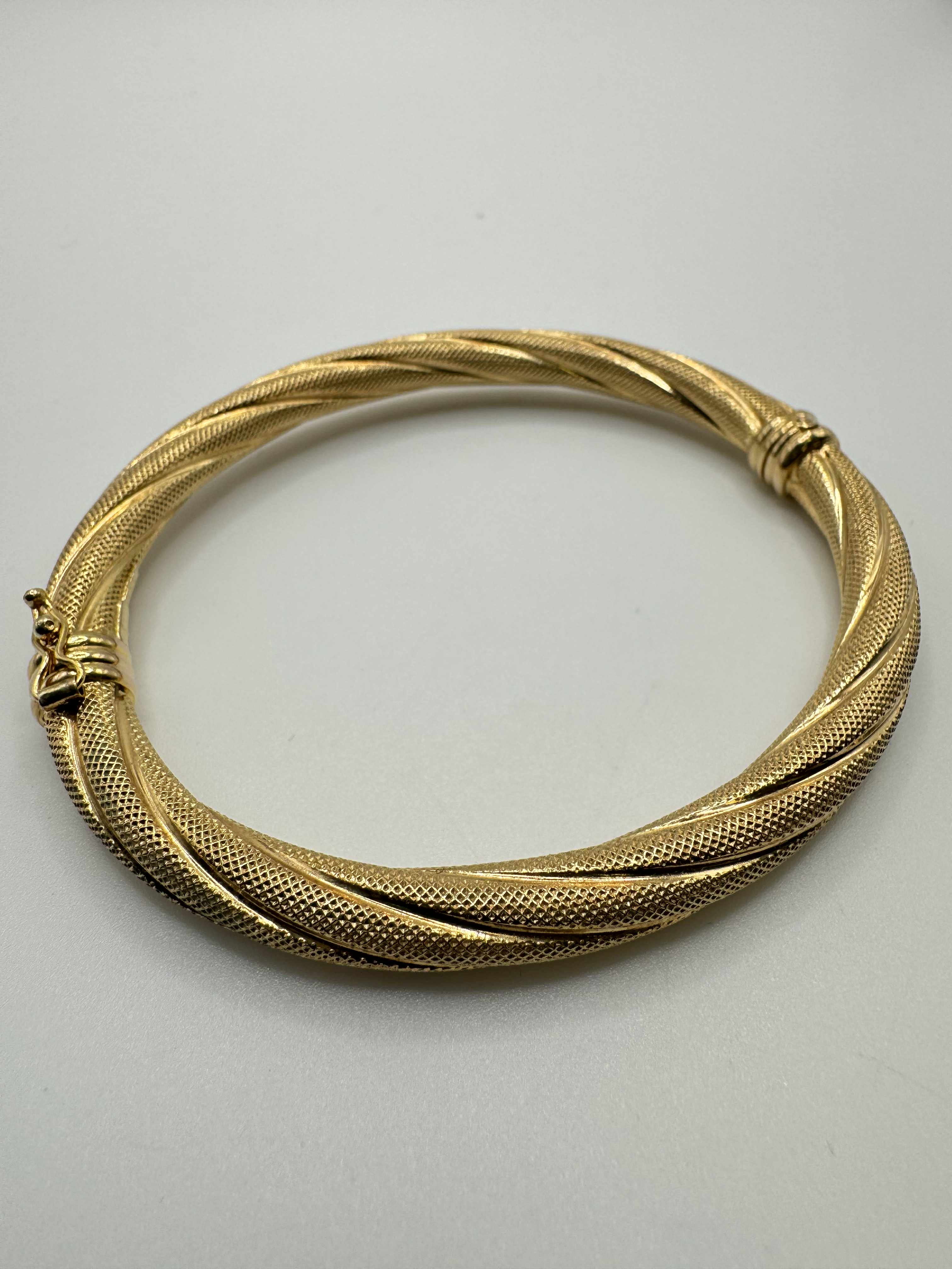 Product photo for 9ct Textured Twisted Bangle