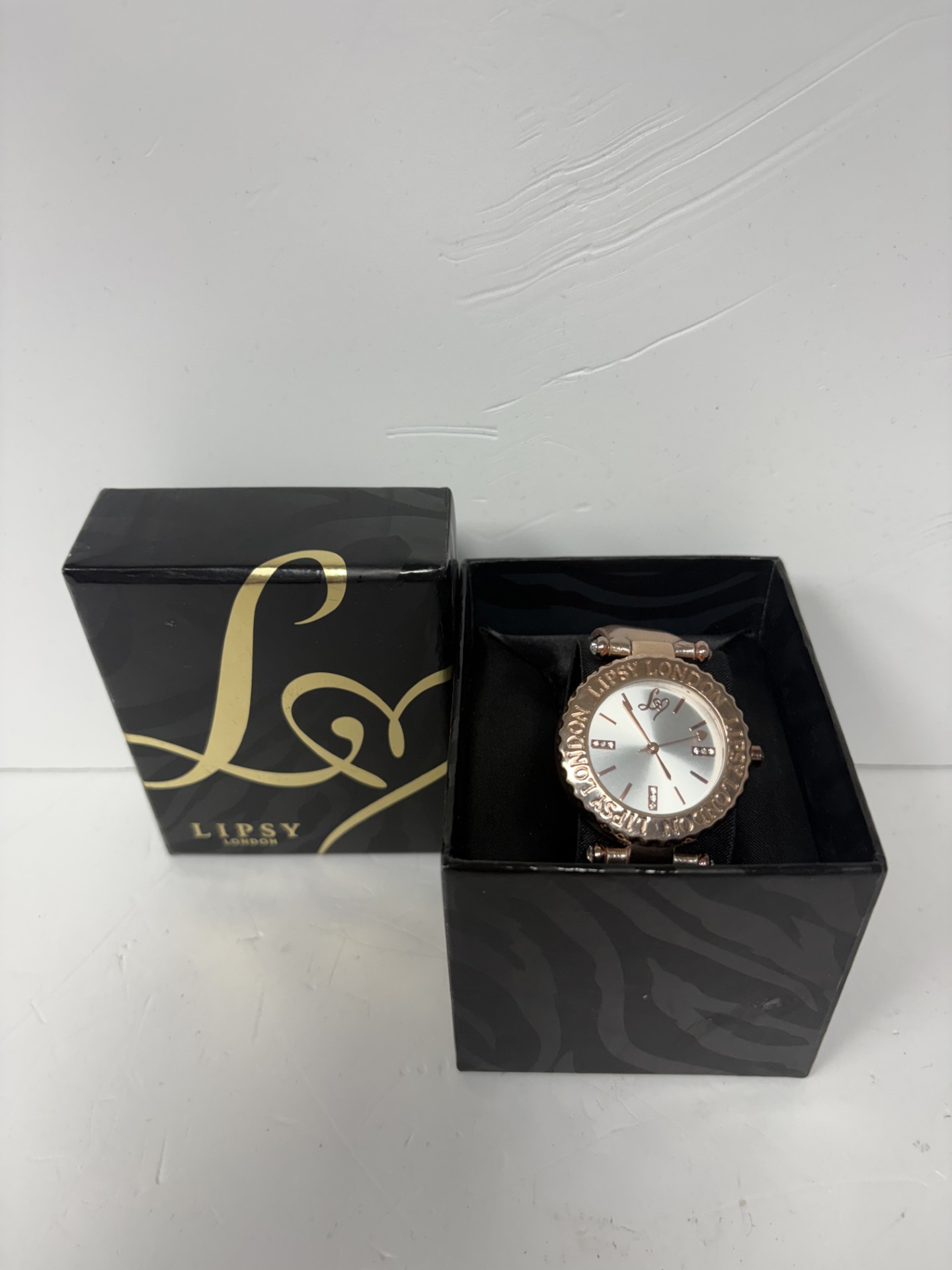 Product photo for Lipsy London rose gold stainless steel watch boxed