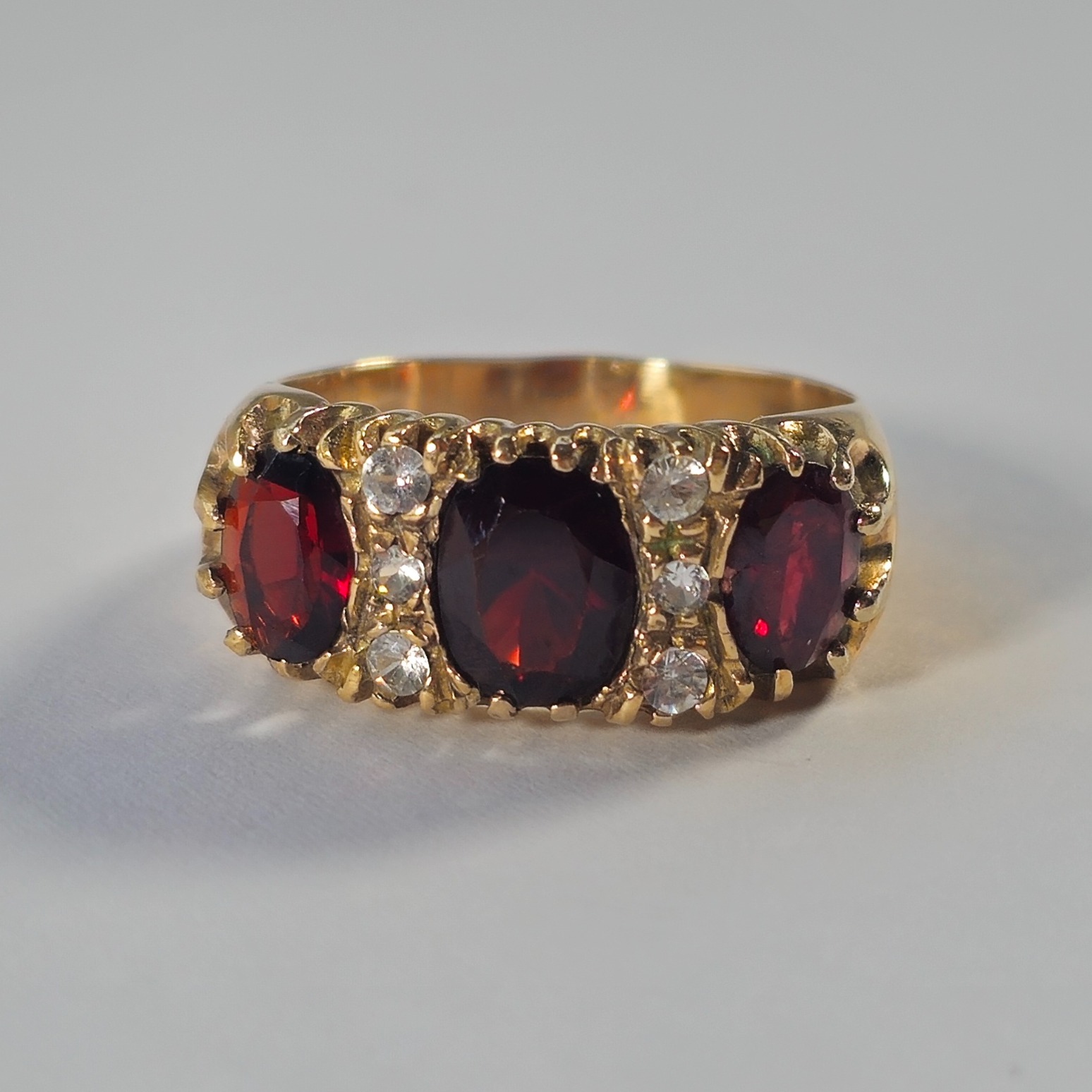 Product photo for 9ct Gold Garnet & *CZ* Half Band Ring Size R