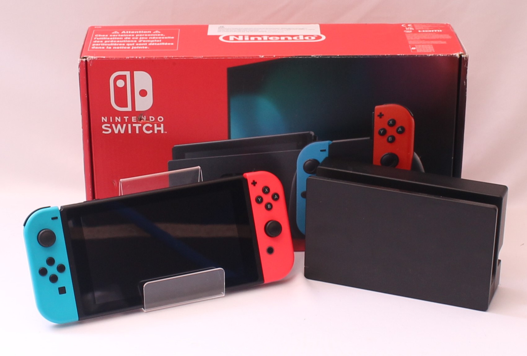 Product photo for Nintendo Switch 32GB Neon Red / Blue Home Games Console - Boxed (U)