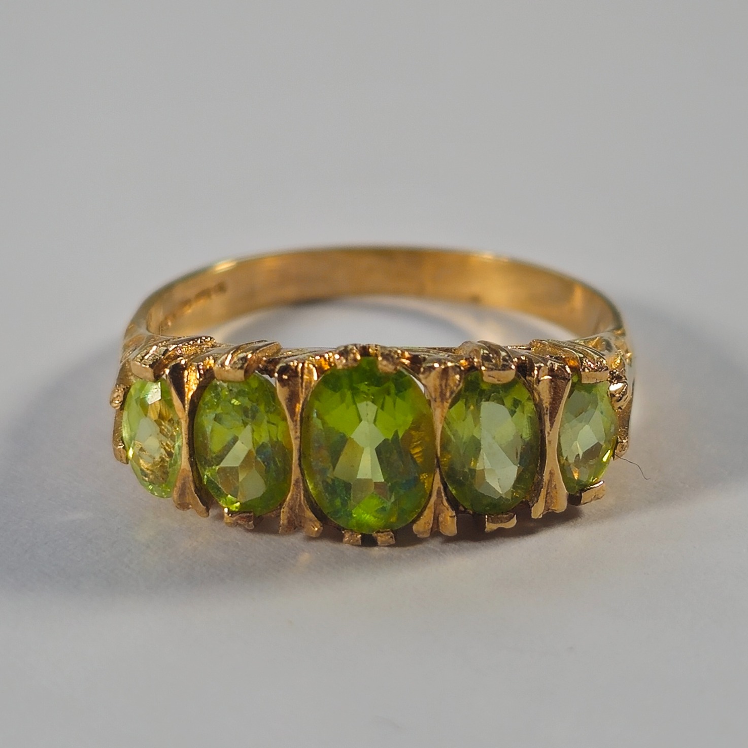 Product photo for 9ct Gold Oval Green Stone Half Band Ring Size Q1/2