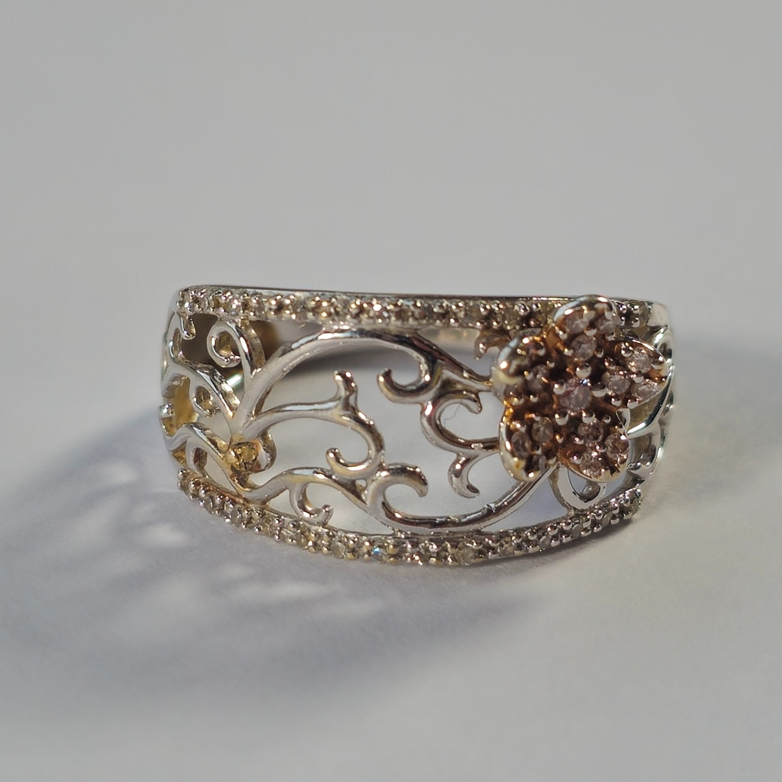 Product photo for 9ct Gold Diamond Flower Pierced Band Ring Size O