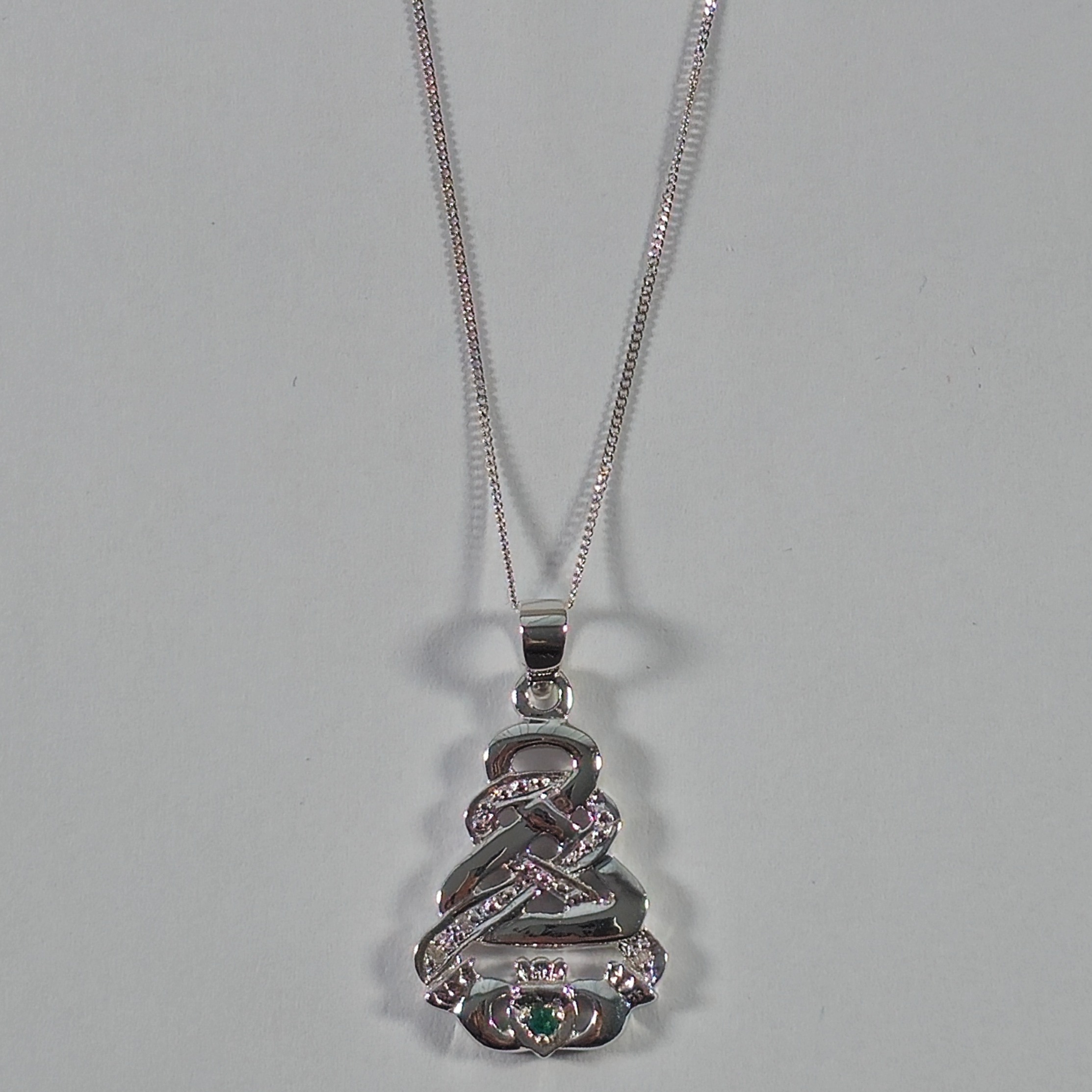 Product photo for 9ct White Gold Emerald Claddagh Celtic Pendant & Chain 20