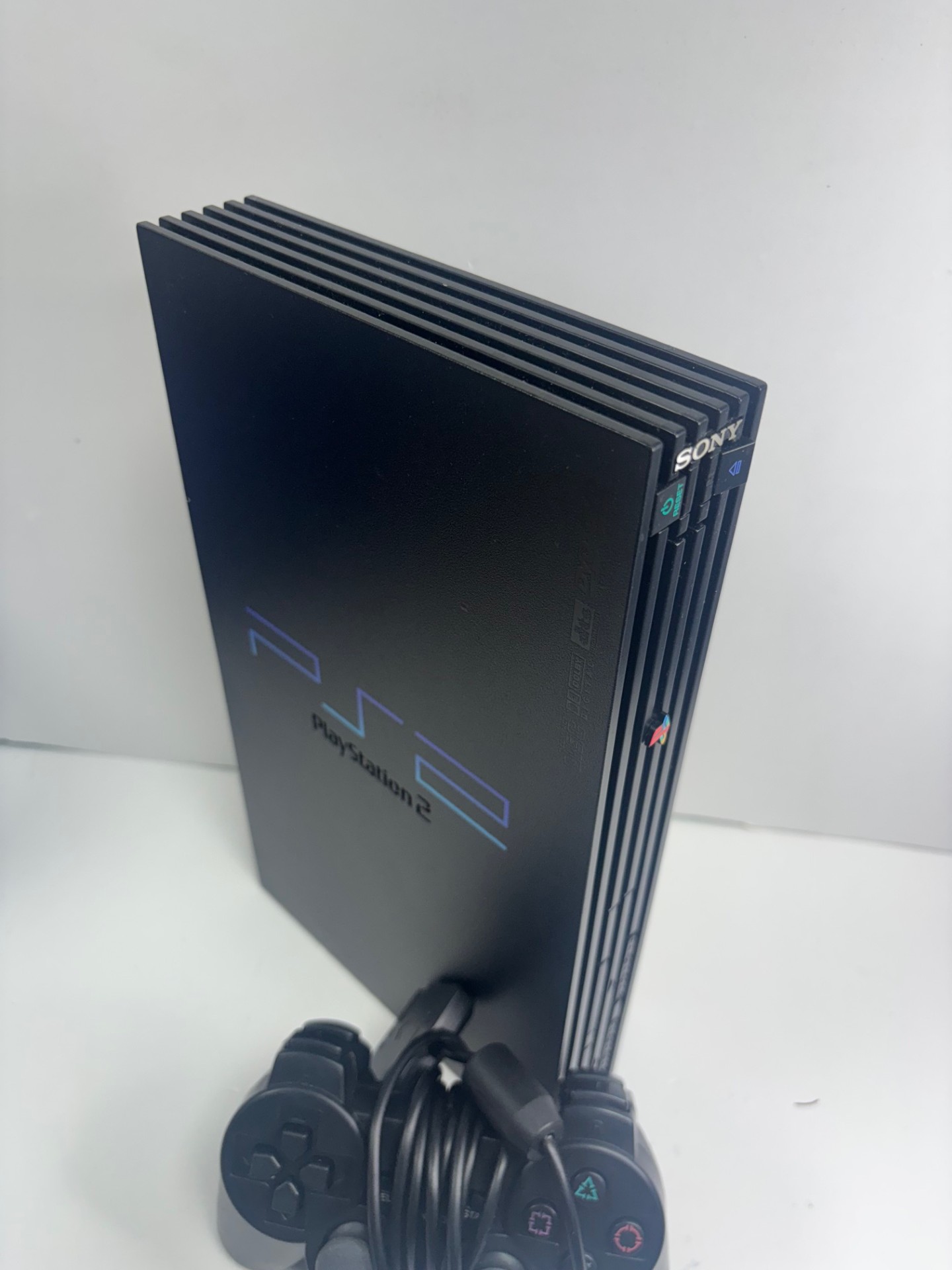 Product photo for ps2 console with controller