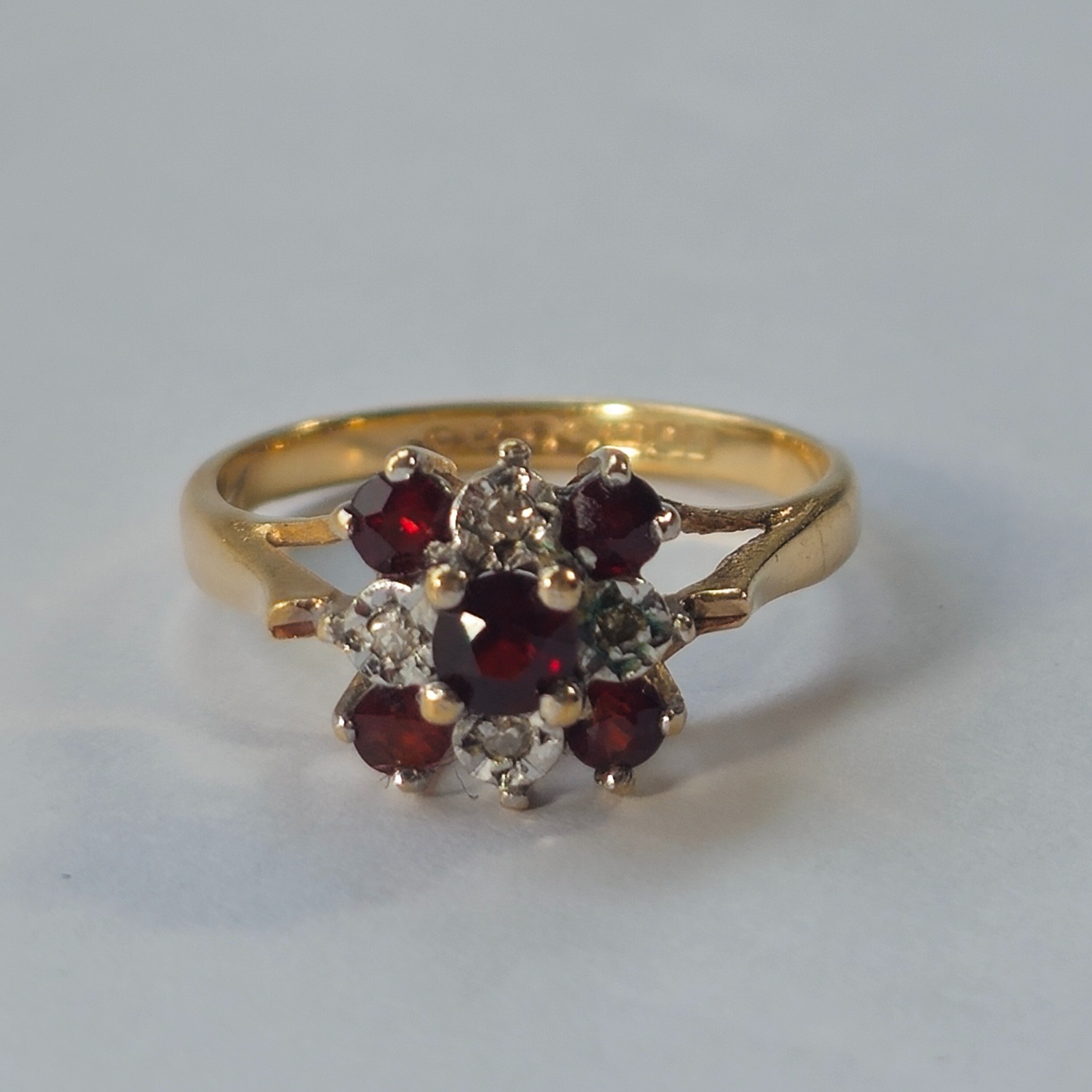 Product photo for 9ct Gold Garnet & Diamond Flower Ring Size O