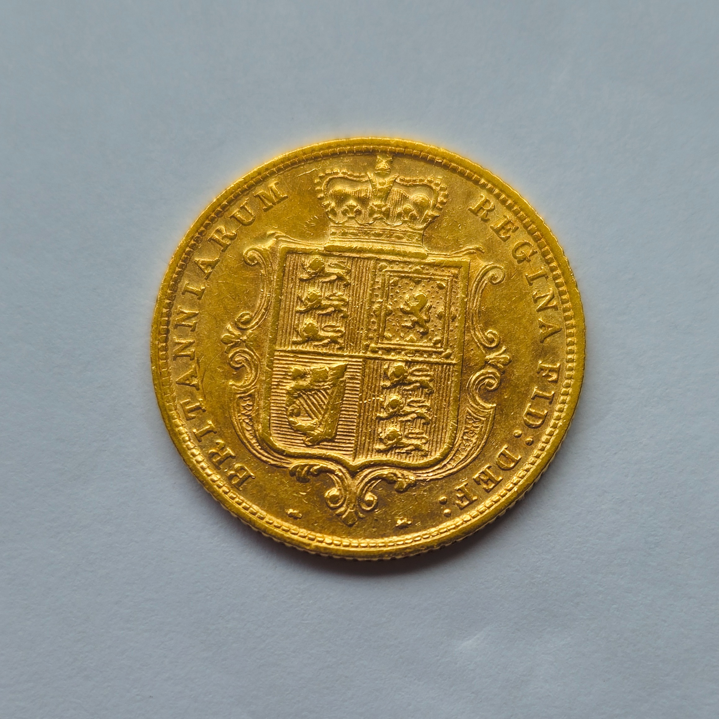 Product photo for 22ct Gold 1883 Victoria Young Head & Shield Back Half Sovereign