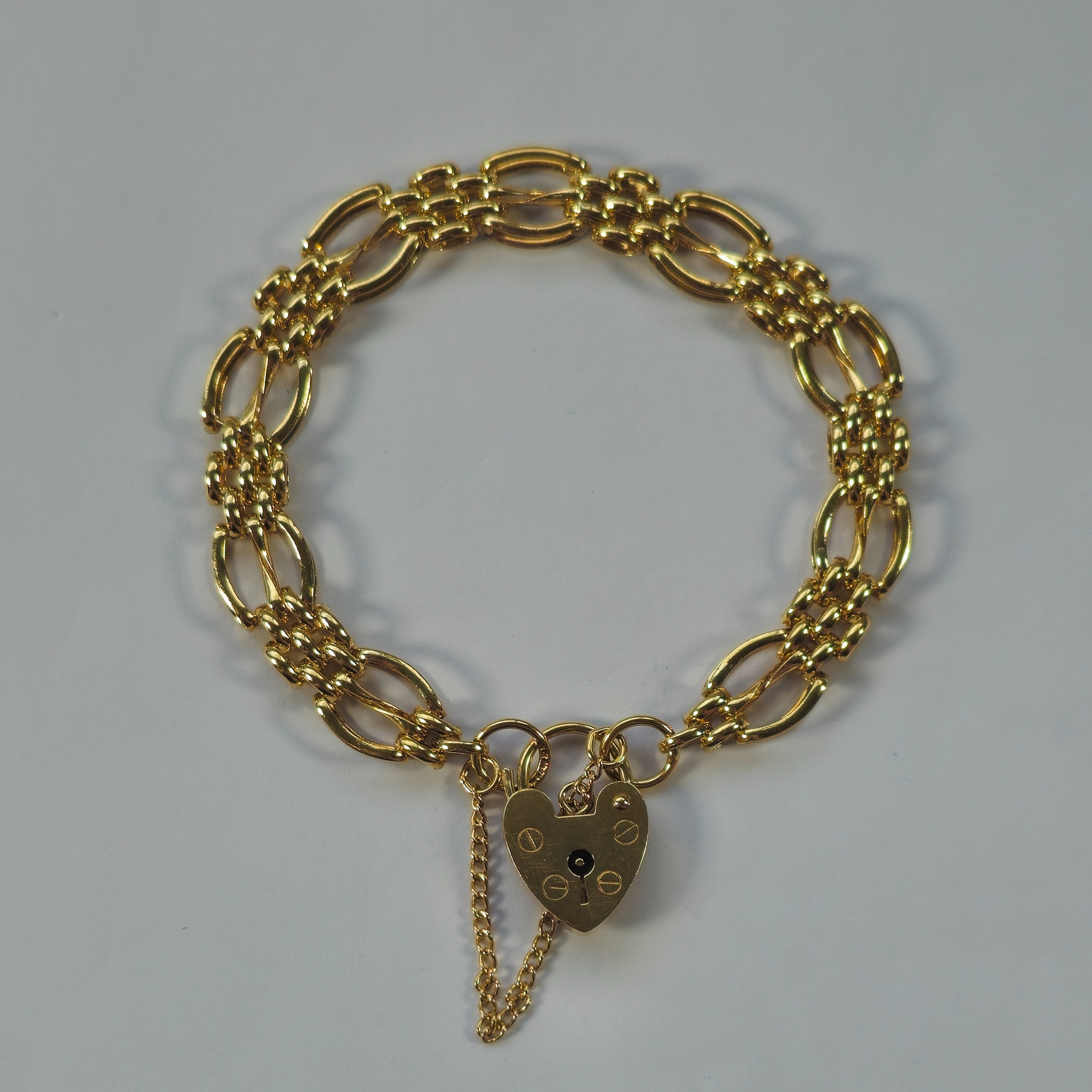 Product photo for 9CT Gold Heart Padlock Gate Bracelet
