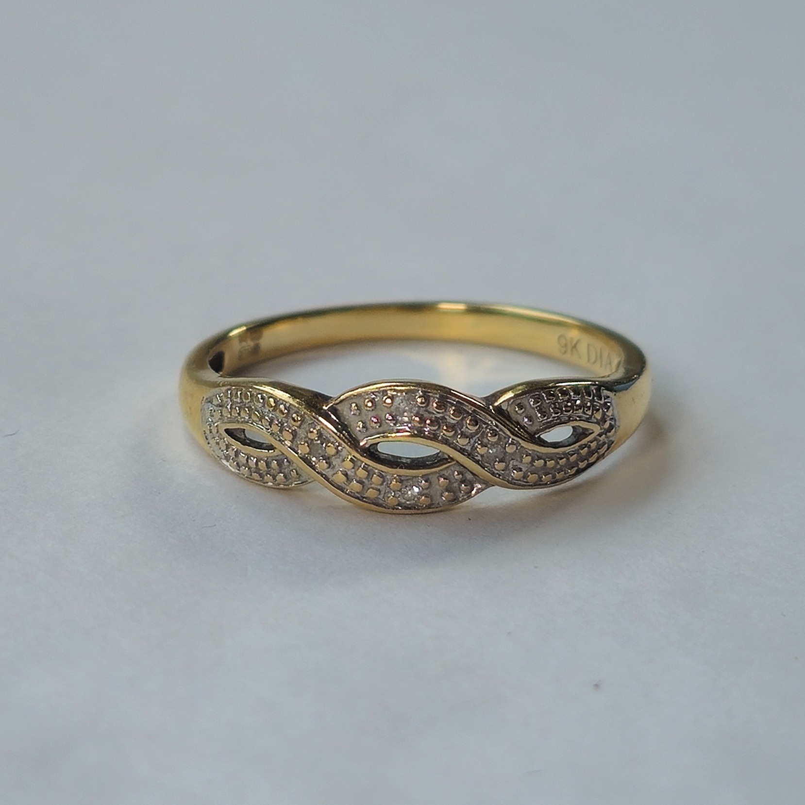 Product photo for 9ct Gold Diamond Braid / Infinity Half Band Ring Size O
