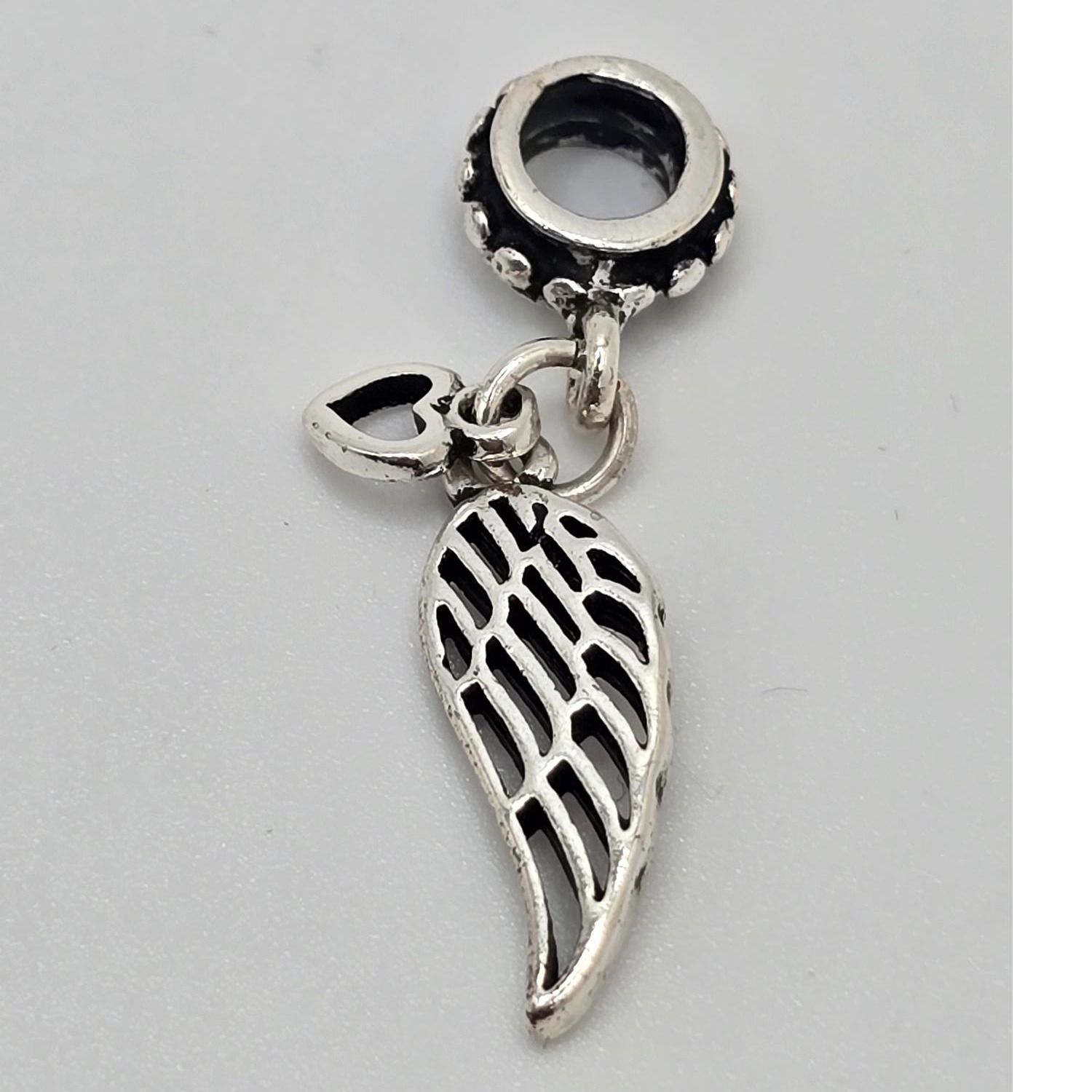 Product photo for Angel Wing Charm - Base Metal Unbranded