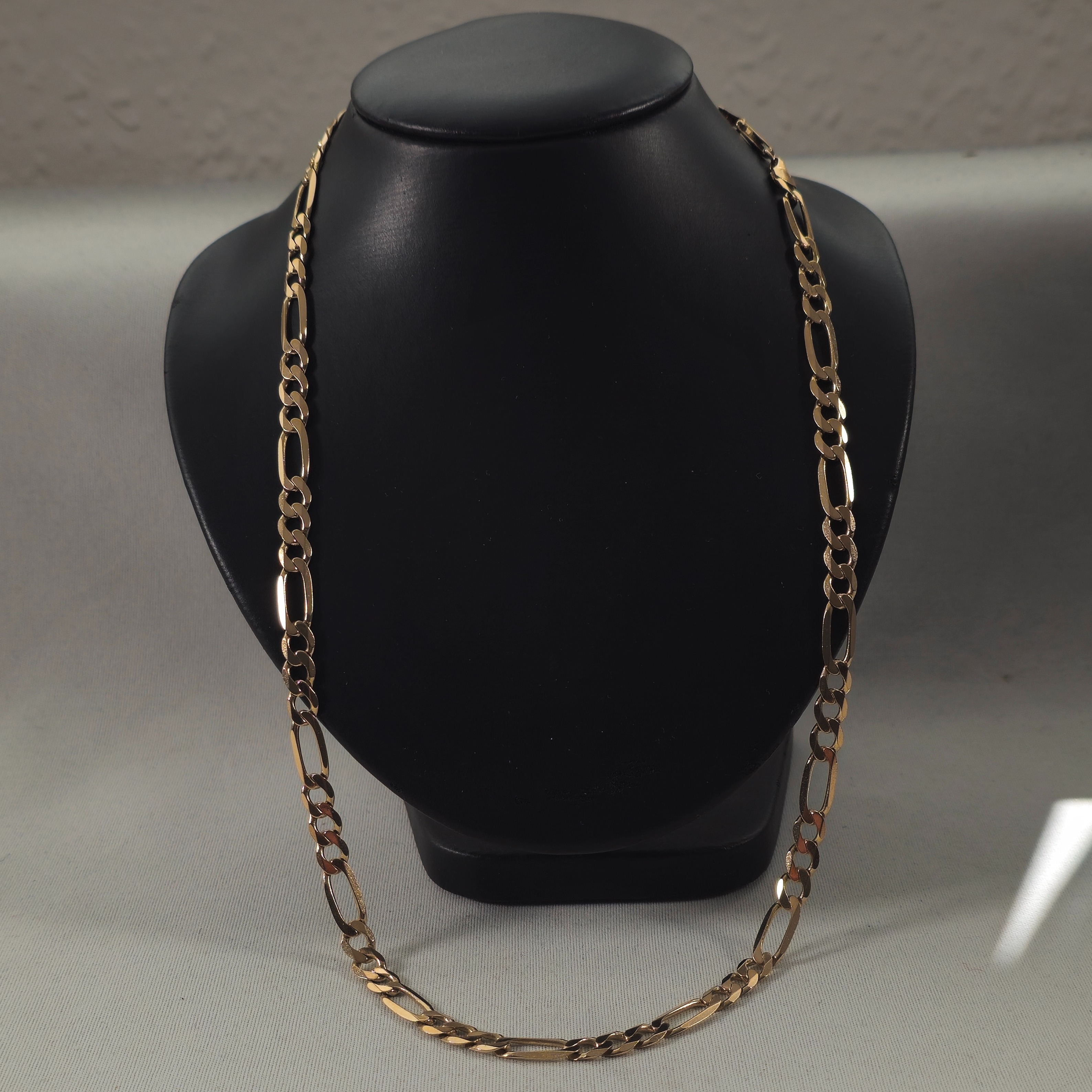 Product photo for 9ct Gold Figaro Chain 22.44