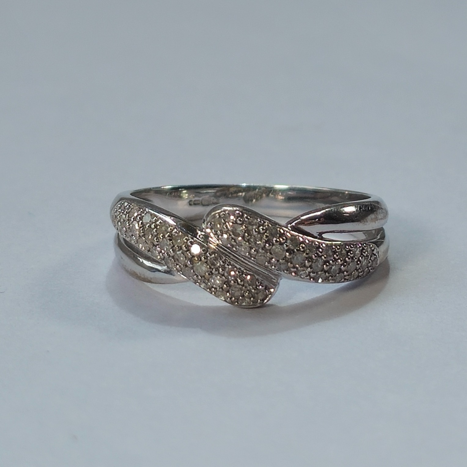 Product photo for 9ct White Gold 0.25ct Diamond Kissing infinity Knot Style Dress Band Ring Size O