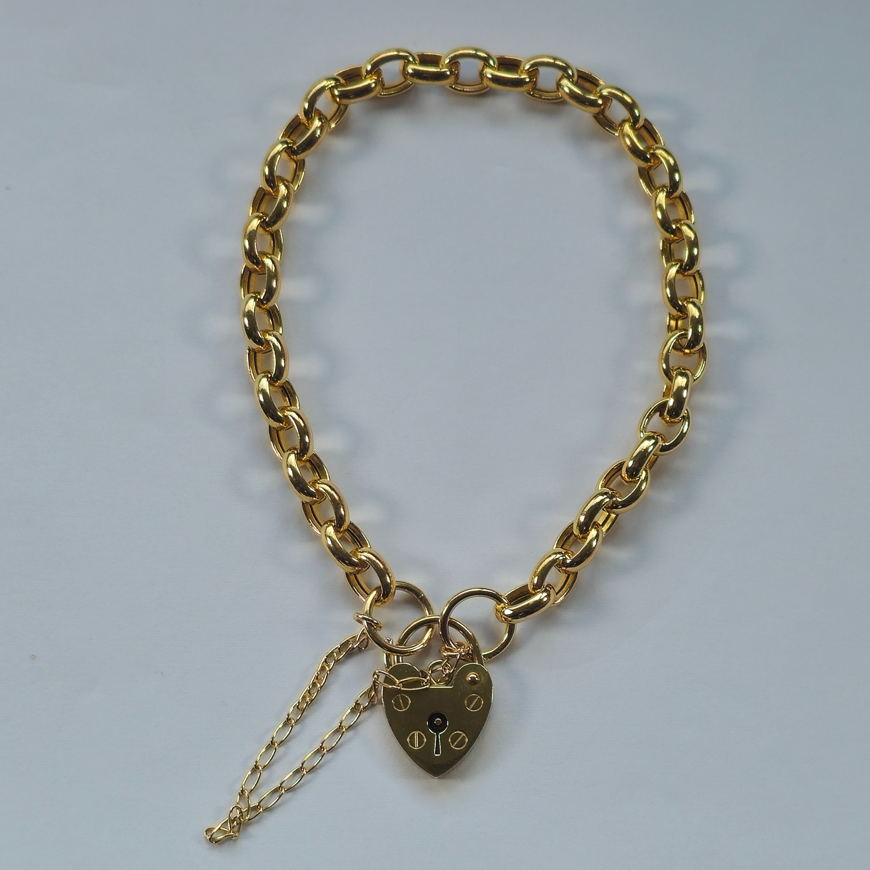 Product photo for 9ct Gold Heart Padlock Hollow Oval Links Bracelet