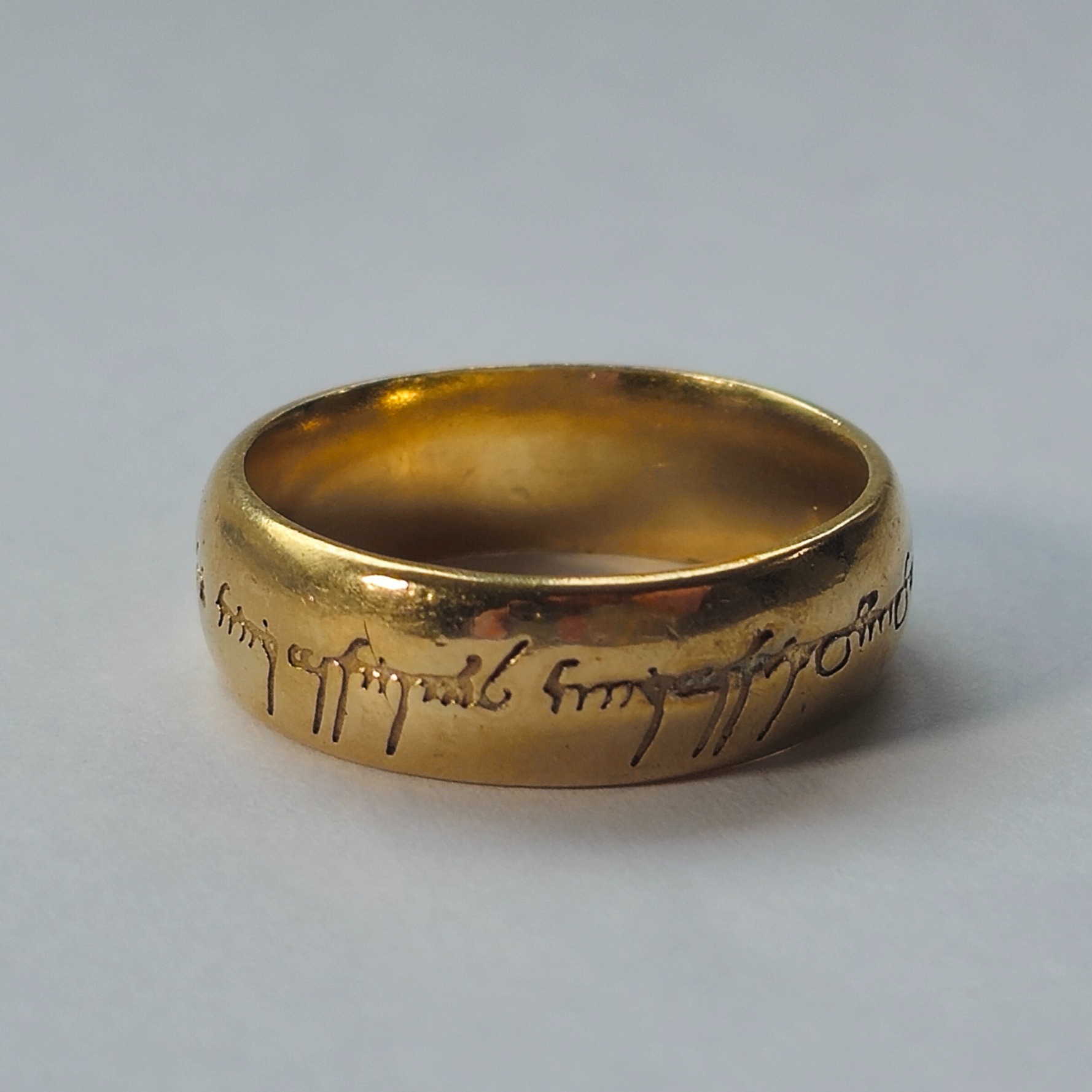 Product photo for 9ct Gold Lord Of The Rings Band Ring Size O1/2