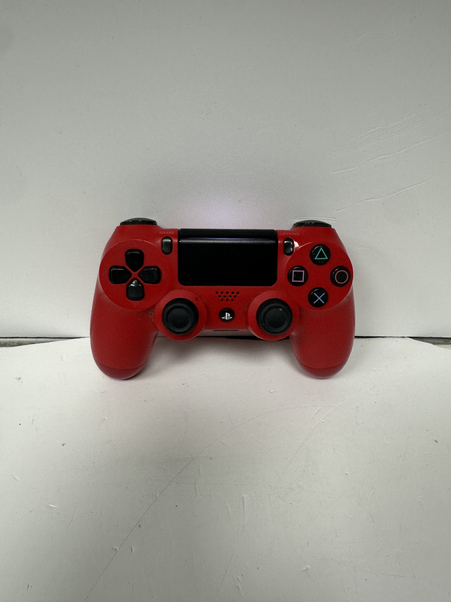 Product photo for PS4 CONTROLLER UNBOXED RED