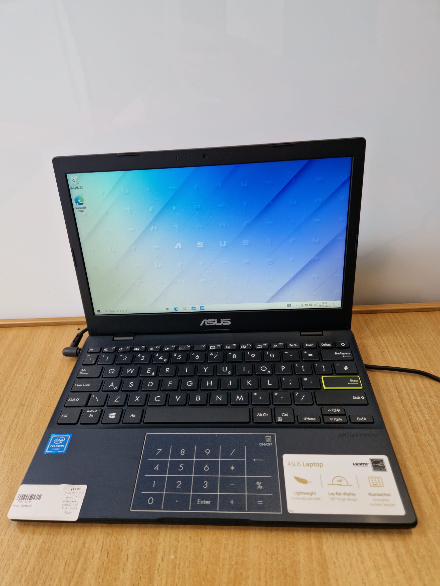 Product photo for Asus  ASUS E210M Laptop 64GB 4GB RAM - Unboxed with Charger 12 Month Warranty