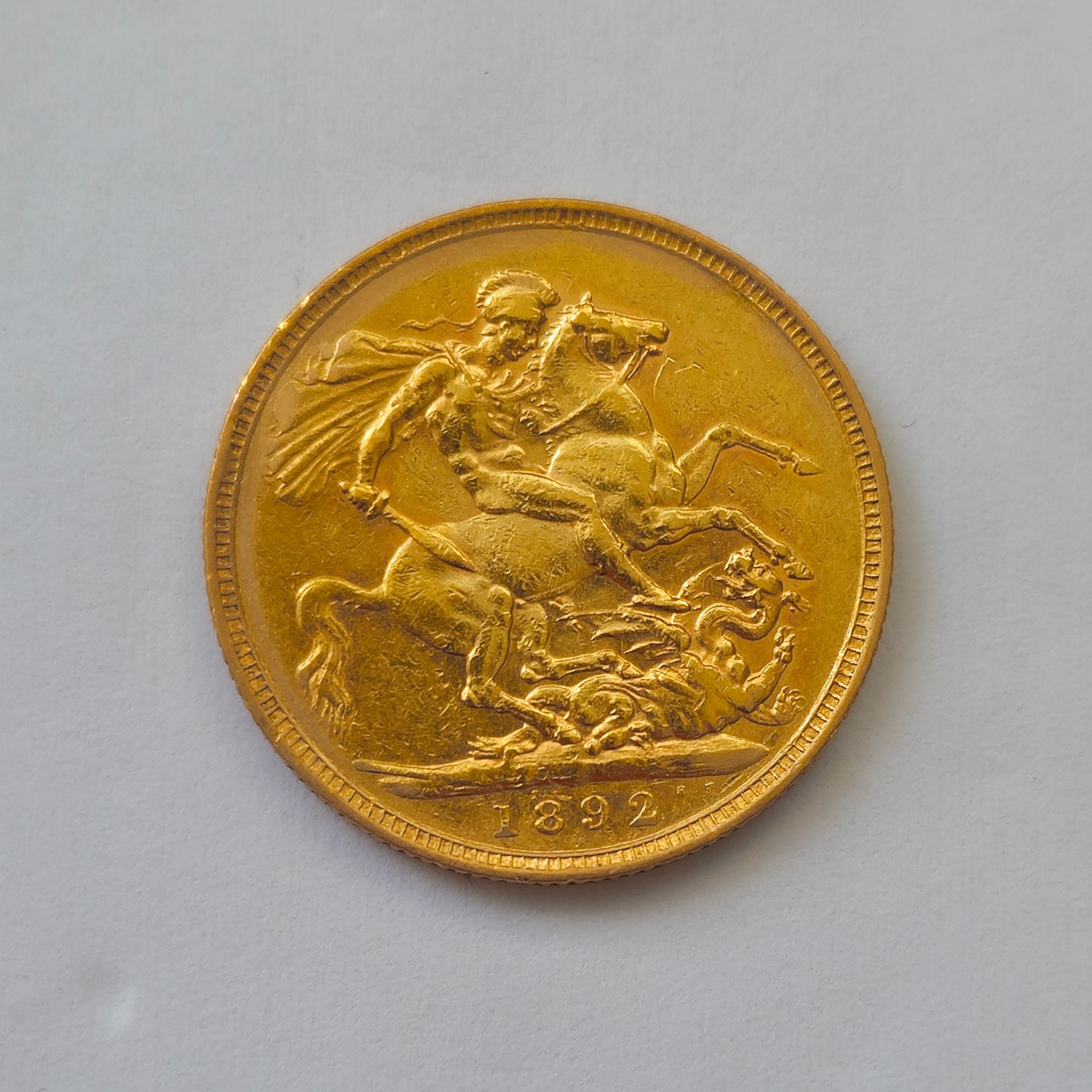 Product photo for 22ct Gold 1892 Victoria 'jubilee head' and St George & the Dragon full sovereign