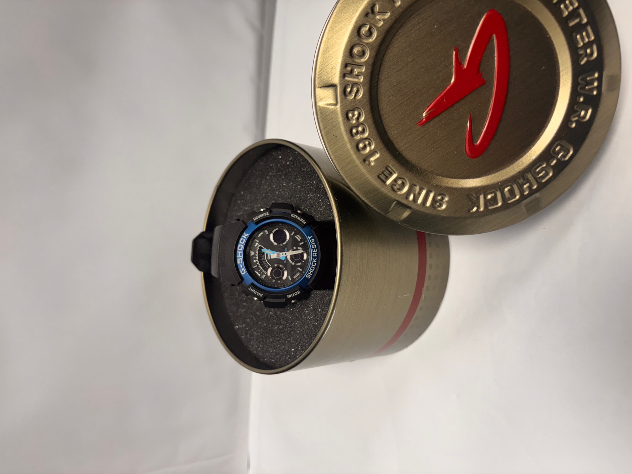 Product photo for g shock gshock tin boxed black and blue rubber strap