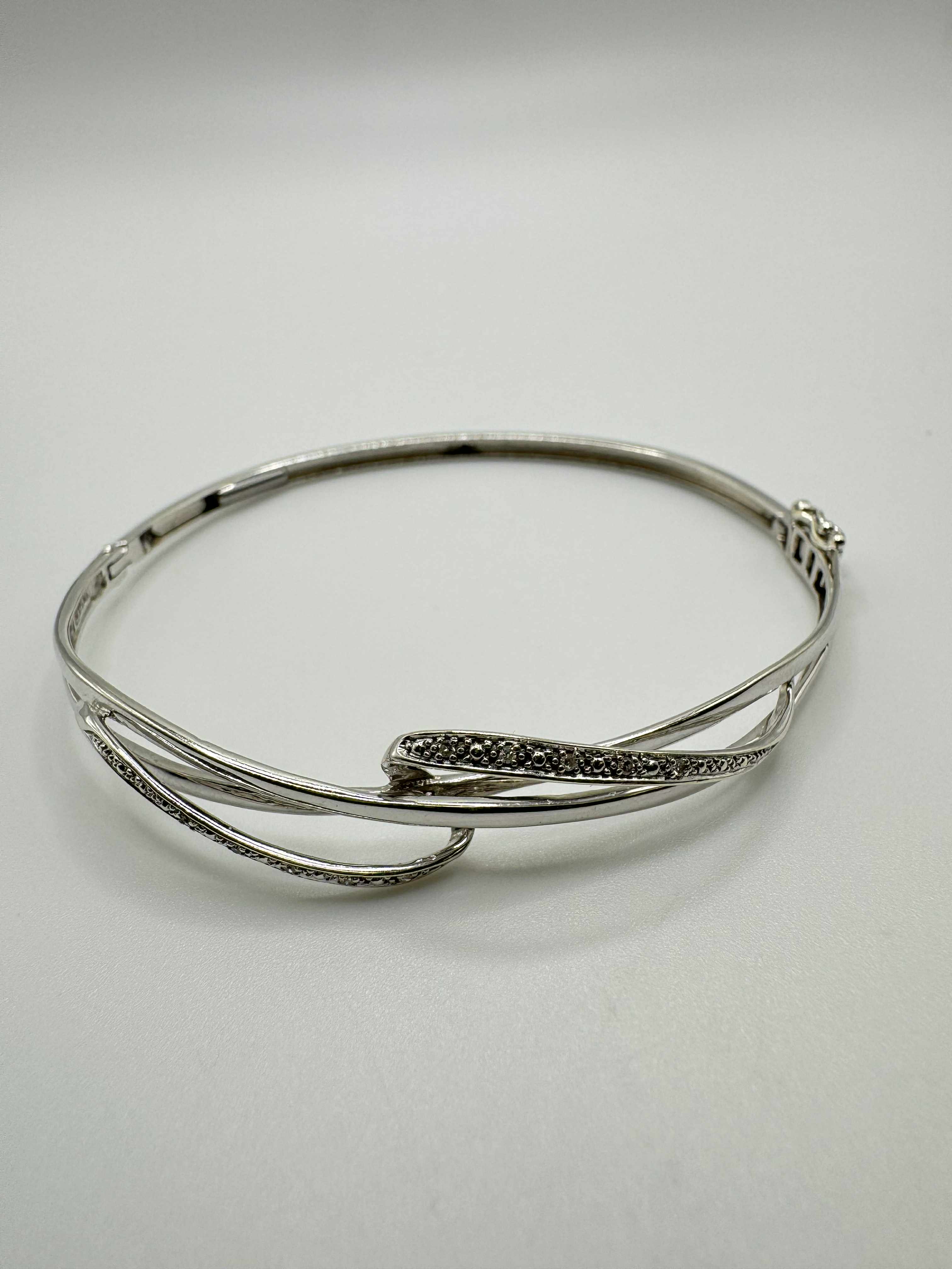 Product photo for 9ct White Gold Three Row Diamond Bangle