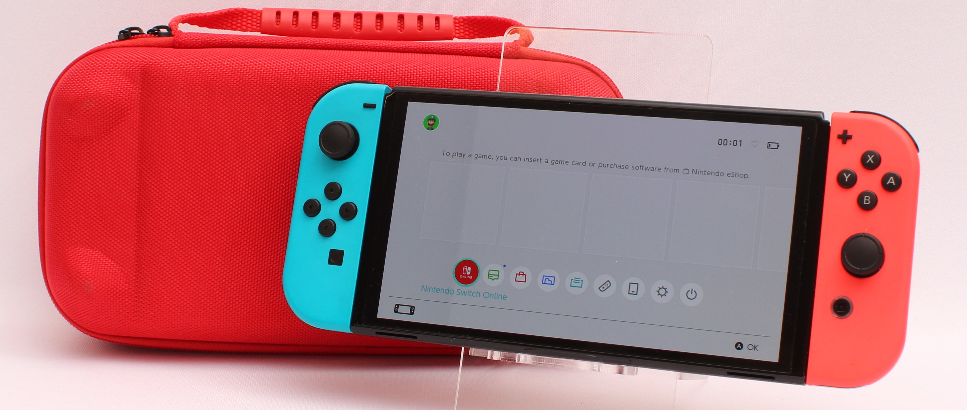 Product photo for Nintendo Switch OLED 64GB Handheld Home Games Console with Carry Case (U)