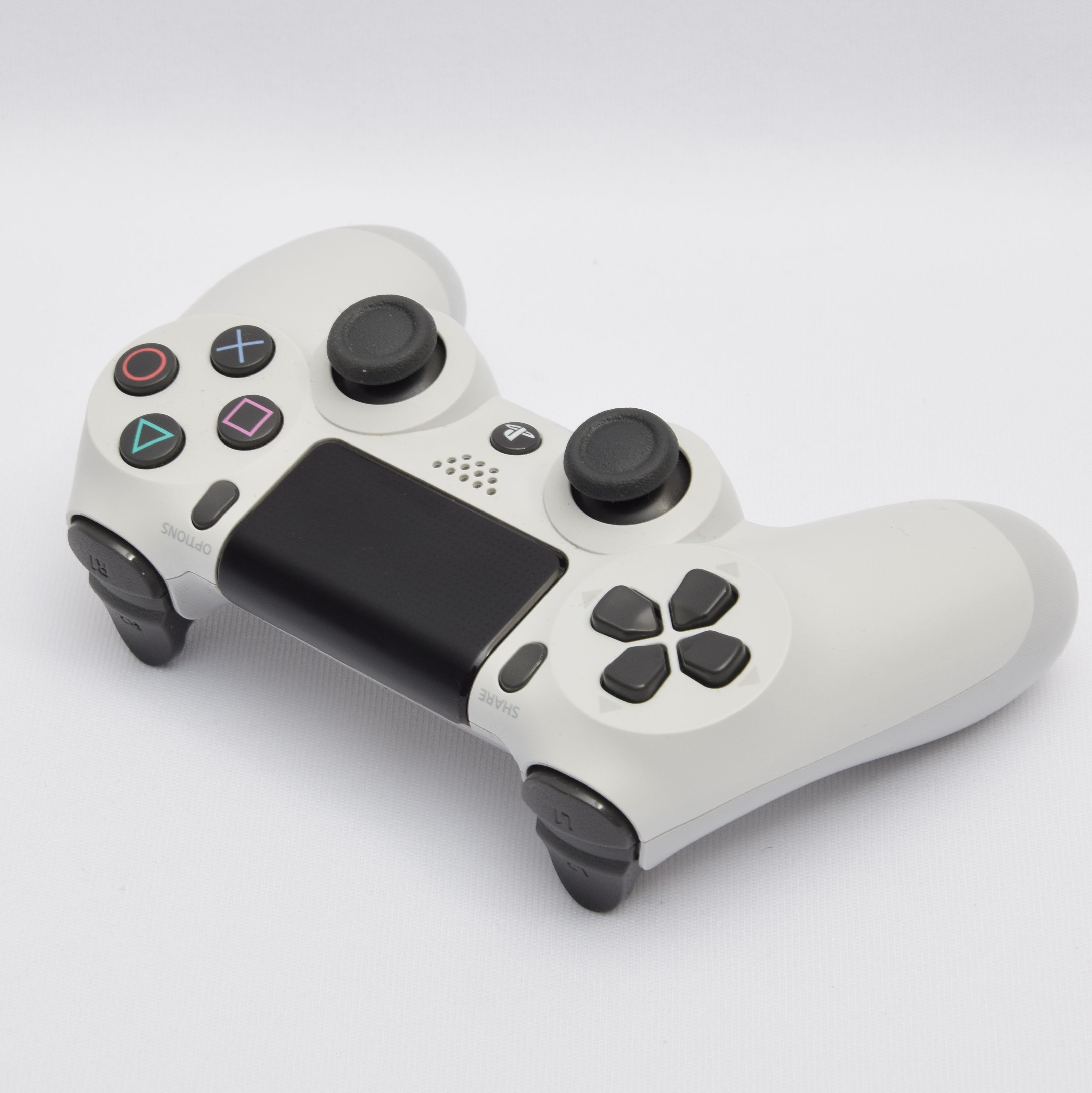 Product photo for Sony CUH-ZCT2E PlayStation 4 Wireless Dualshock Control Pad (White) (U)