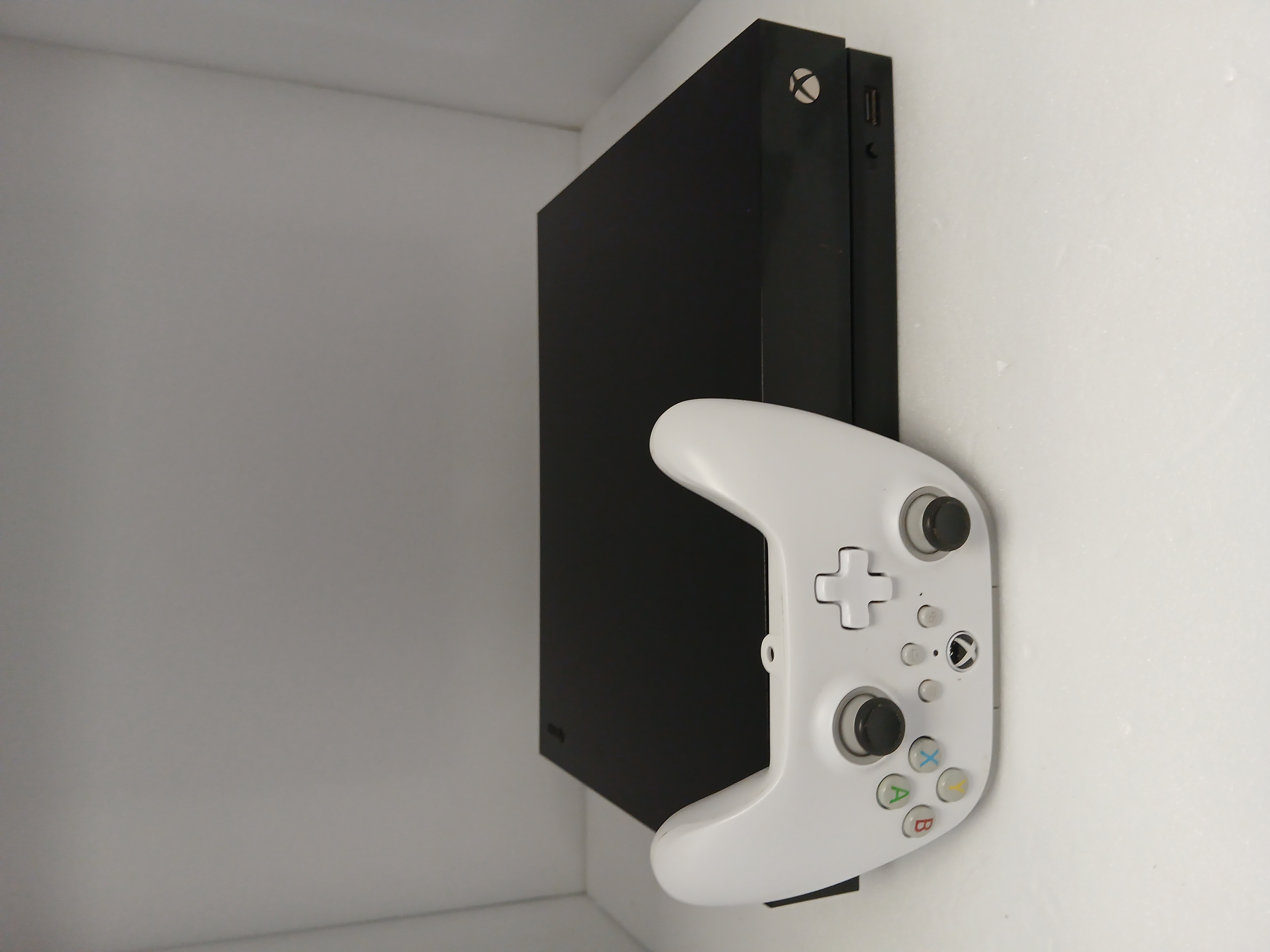 Product photo for Xbox One X Console, 1TB, Black Wired Controller