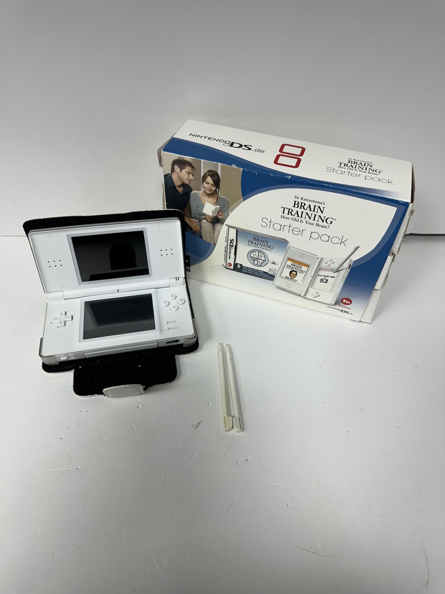 Product photo for NINTENDO DS LITE WHITE CASE WITH BRAIN TRAINING UNBOXED