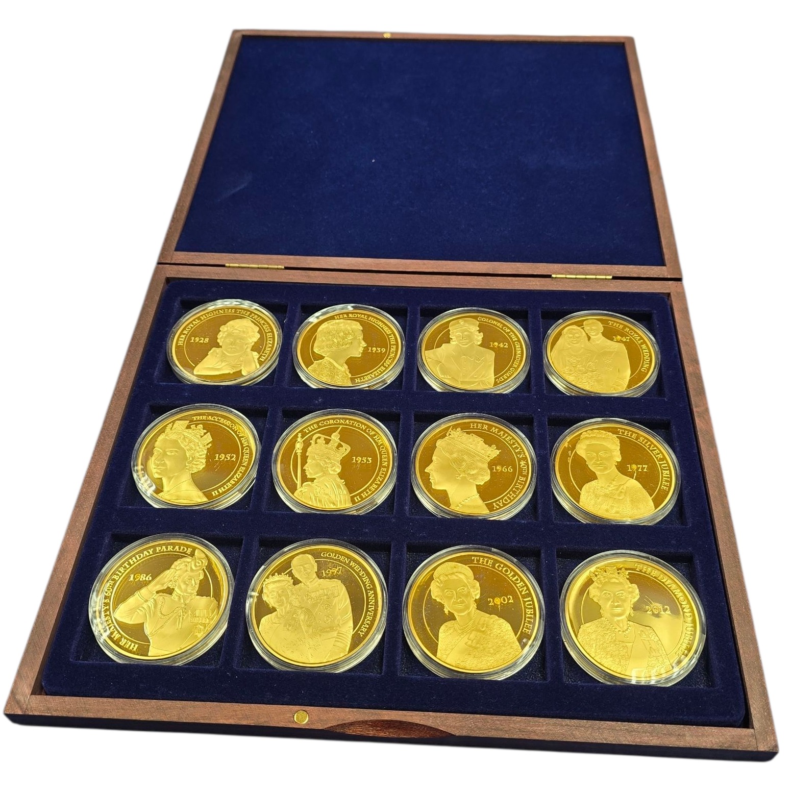 Product photo for 2012 Windsor Mint Portraits of the Queen 12 Medallion Coin Set With COA in Box