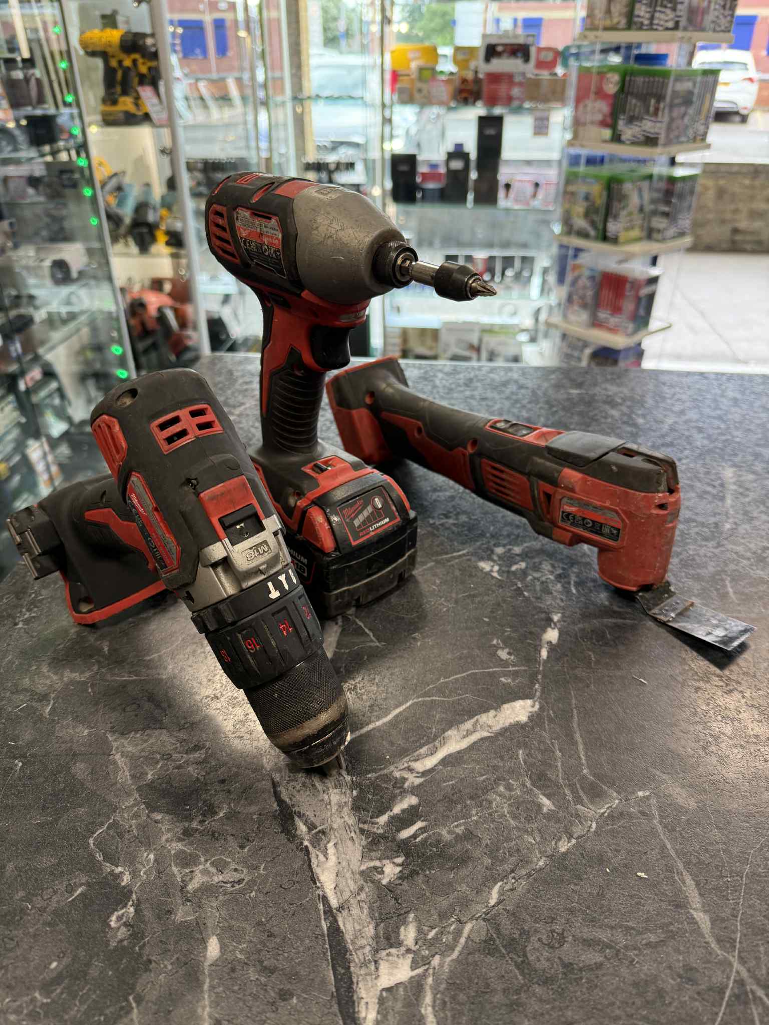 Product photo for Milwaukee M18 Tool Bundle - Impact Driver, Combi Drill & Multi / x1 4.0aH Battery