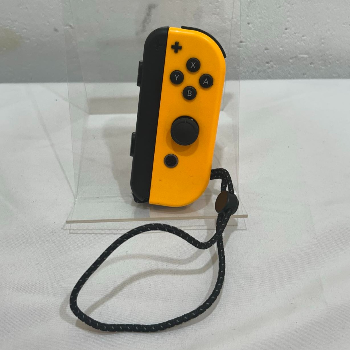 Product photo for Nintendo Switch Right Joy Con - Orange