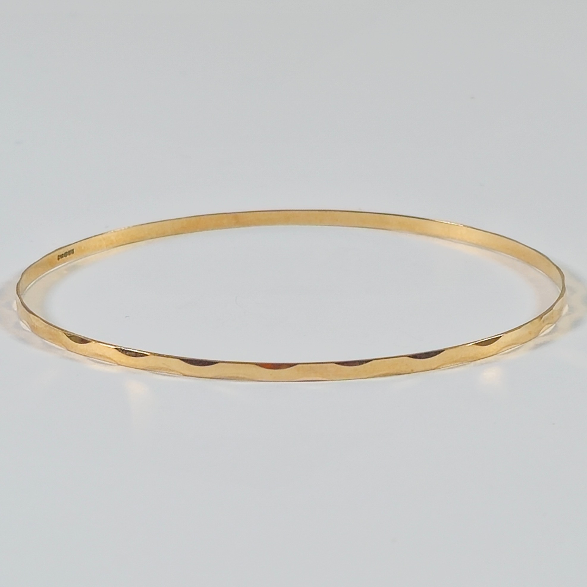 Product photo for 9ct Gold Wave Pattern Slim Stacking Bangle