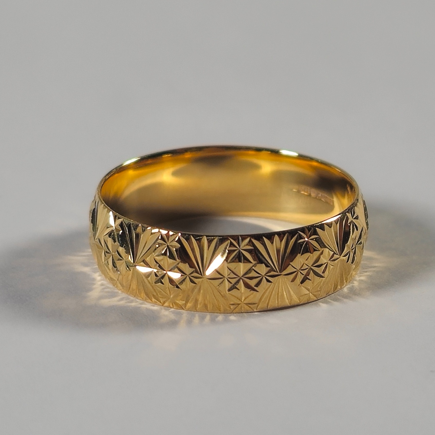 Product photo for 9ct Gold Stars Pattern Band Ring Size Q1/2