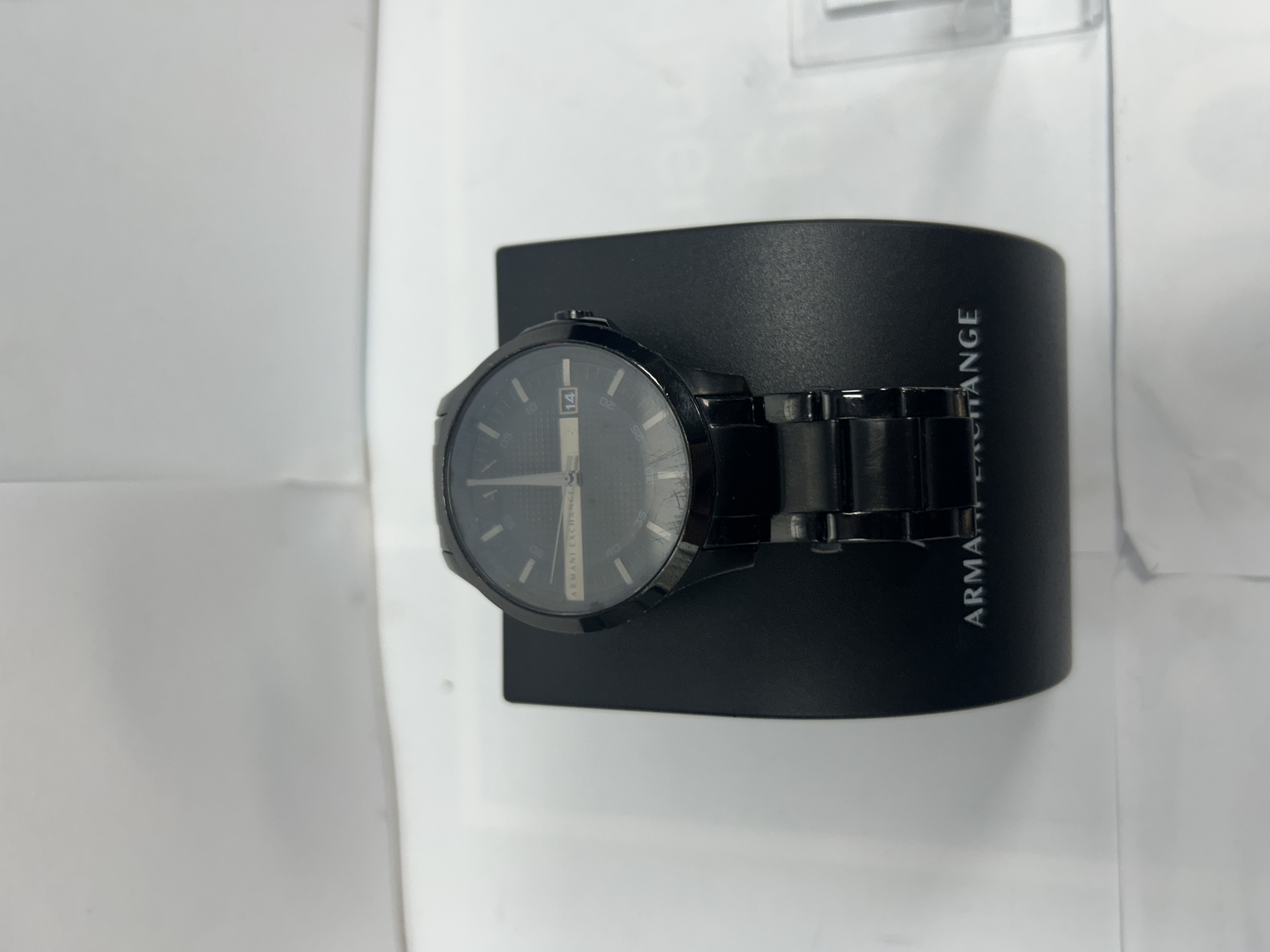 Product photo for armani exchange black few scratches and discolour