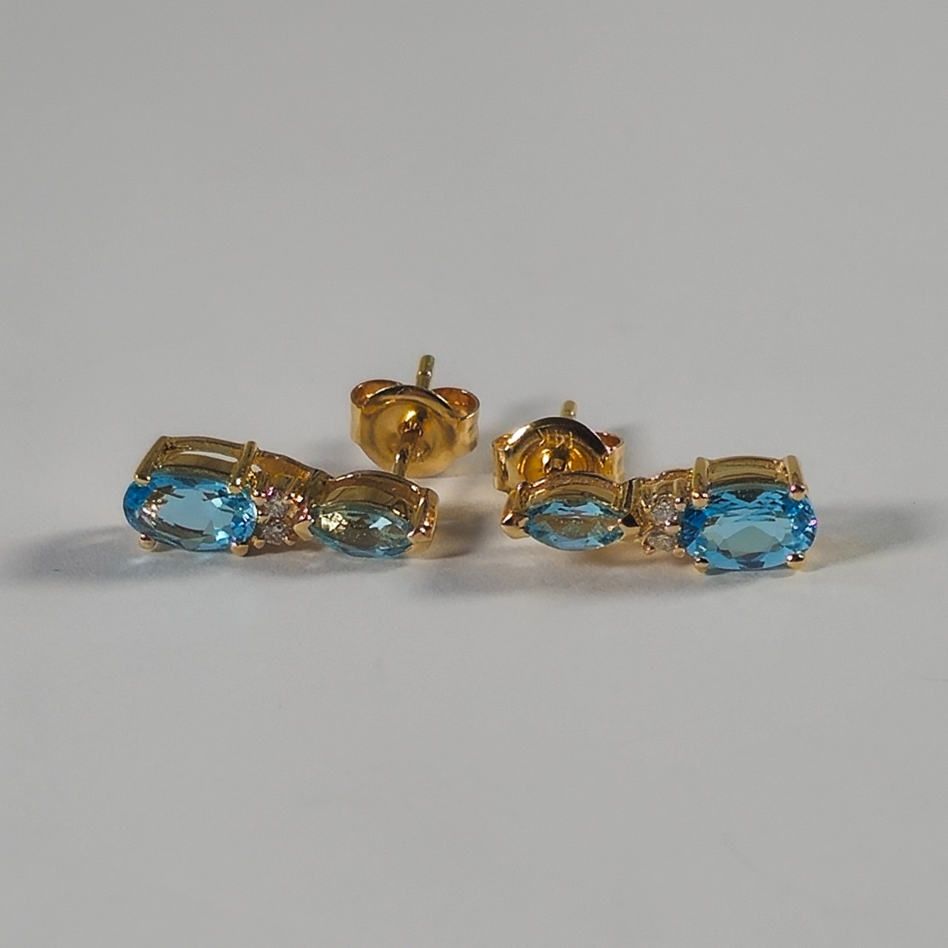 Product photo for 14ct Gold Diamond & Blue Stone Earrings